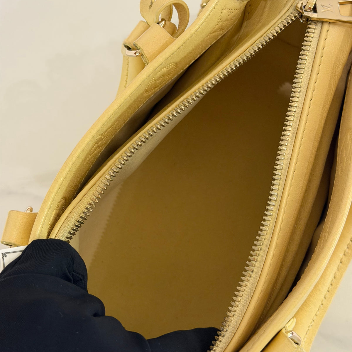 Louis Vuitton Onthego East West Cream Yellow Monogram Embossed Tote | LOUIS VUITTON