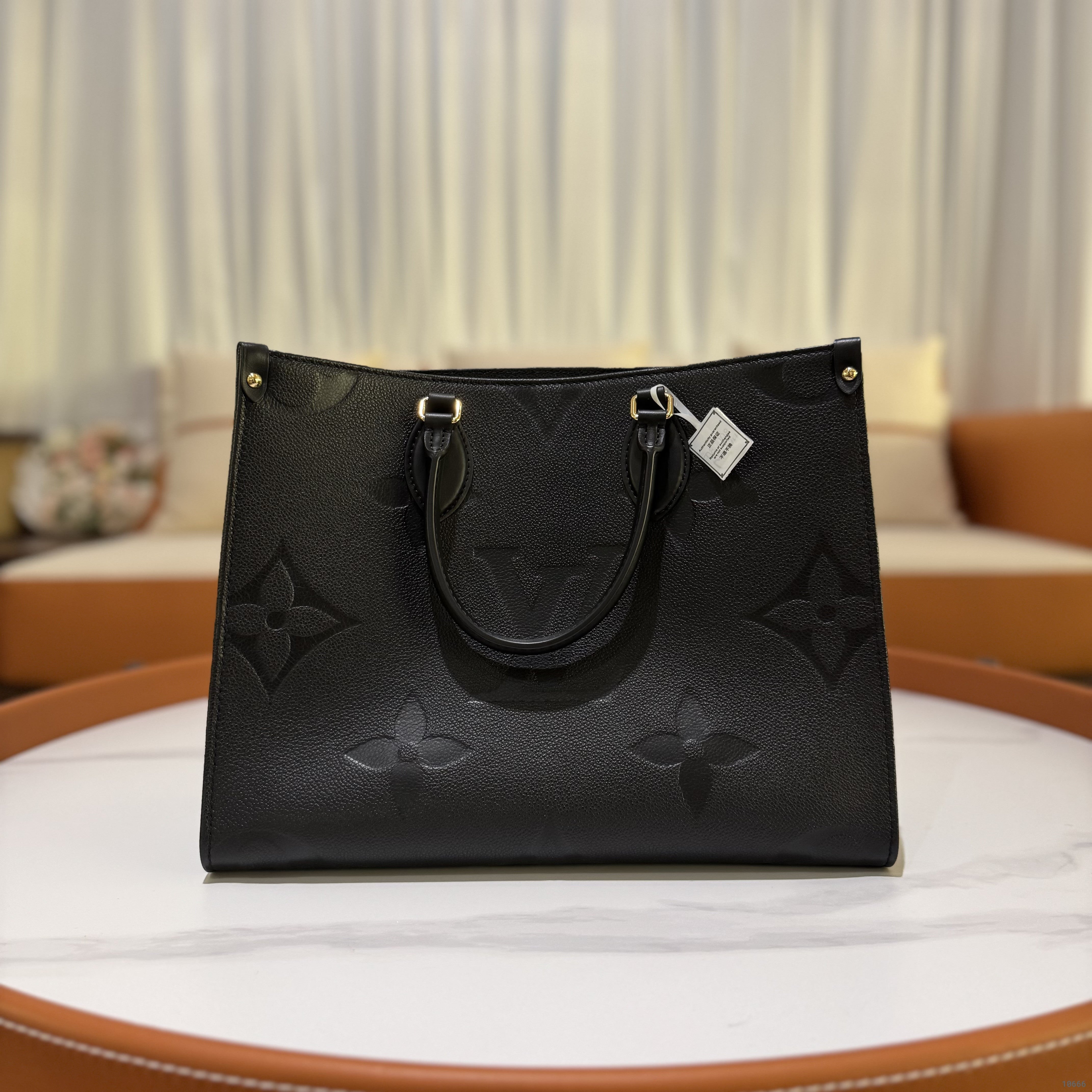 LOUIS VUITTON ON THE GO TOTE BLACK