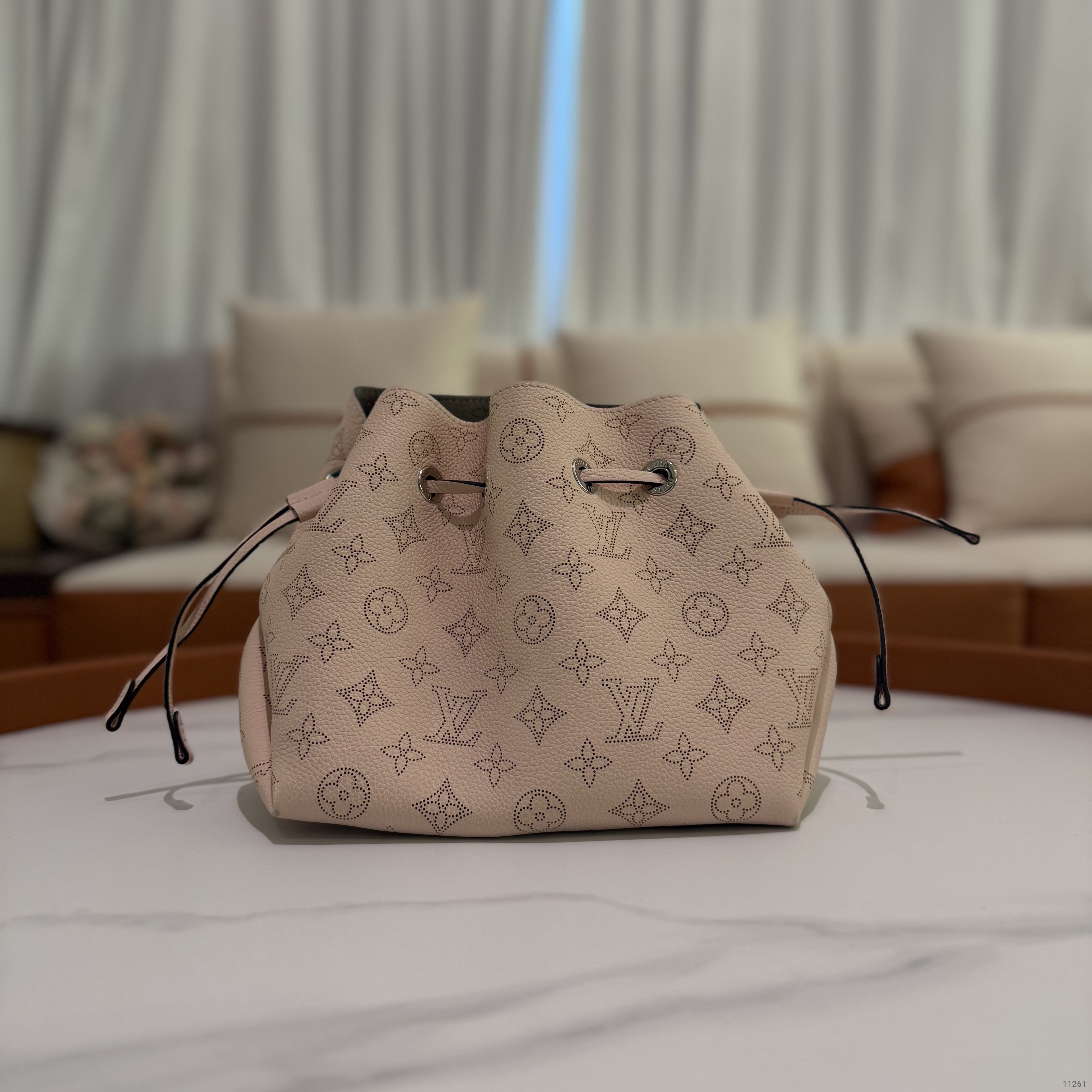 Louis Vuitton Bella Perforated Leather Bucket Bag