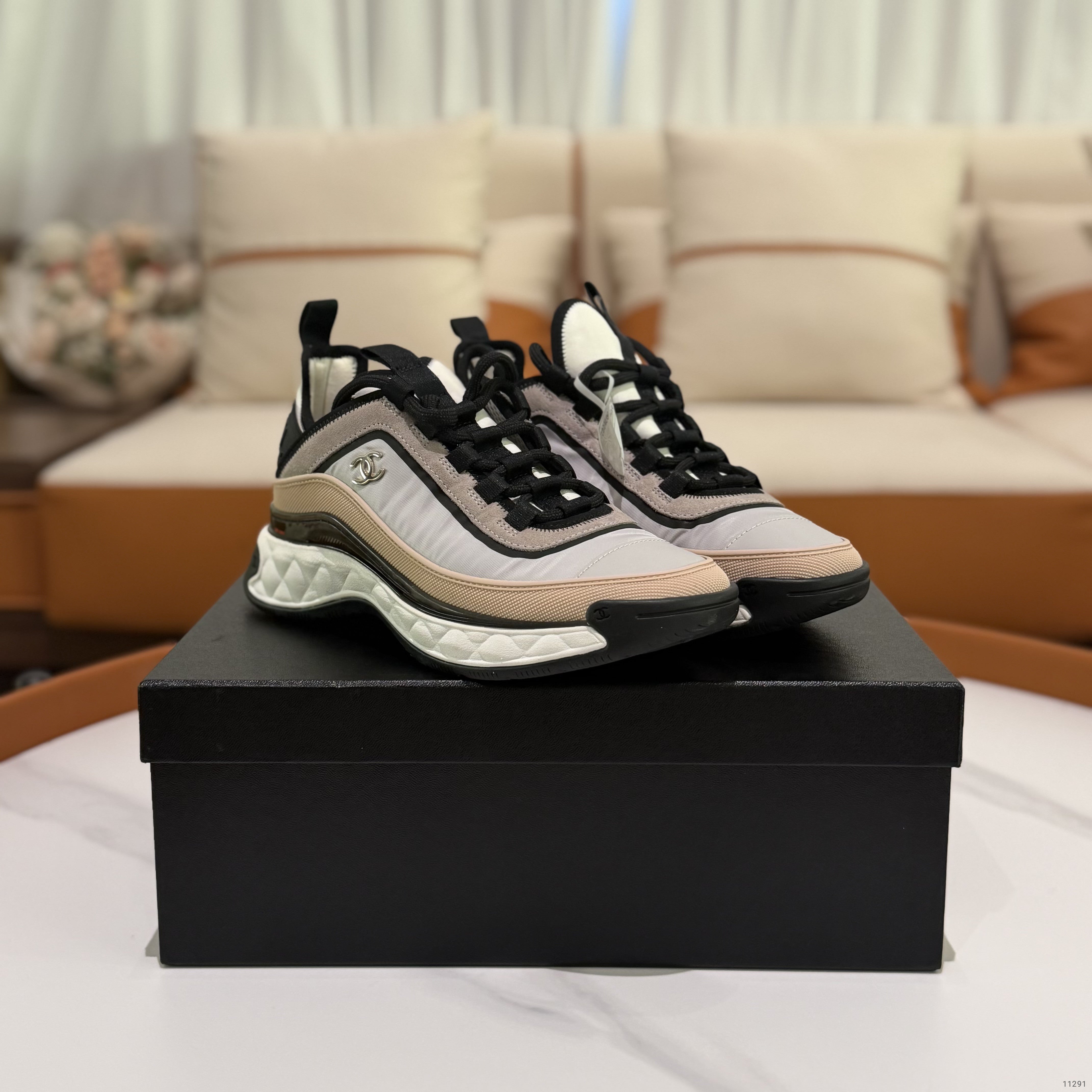 CHANEL White & Pink Casual Sneakers with Gold Logo