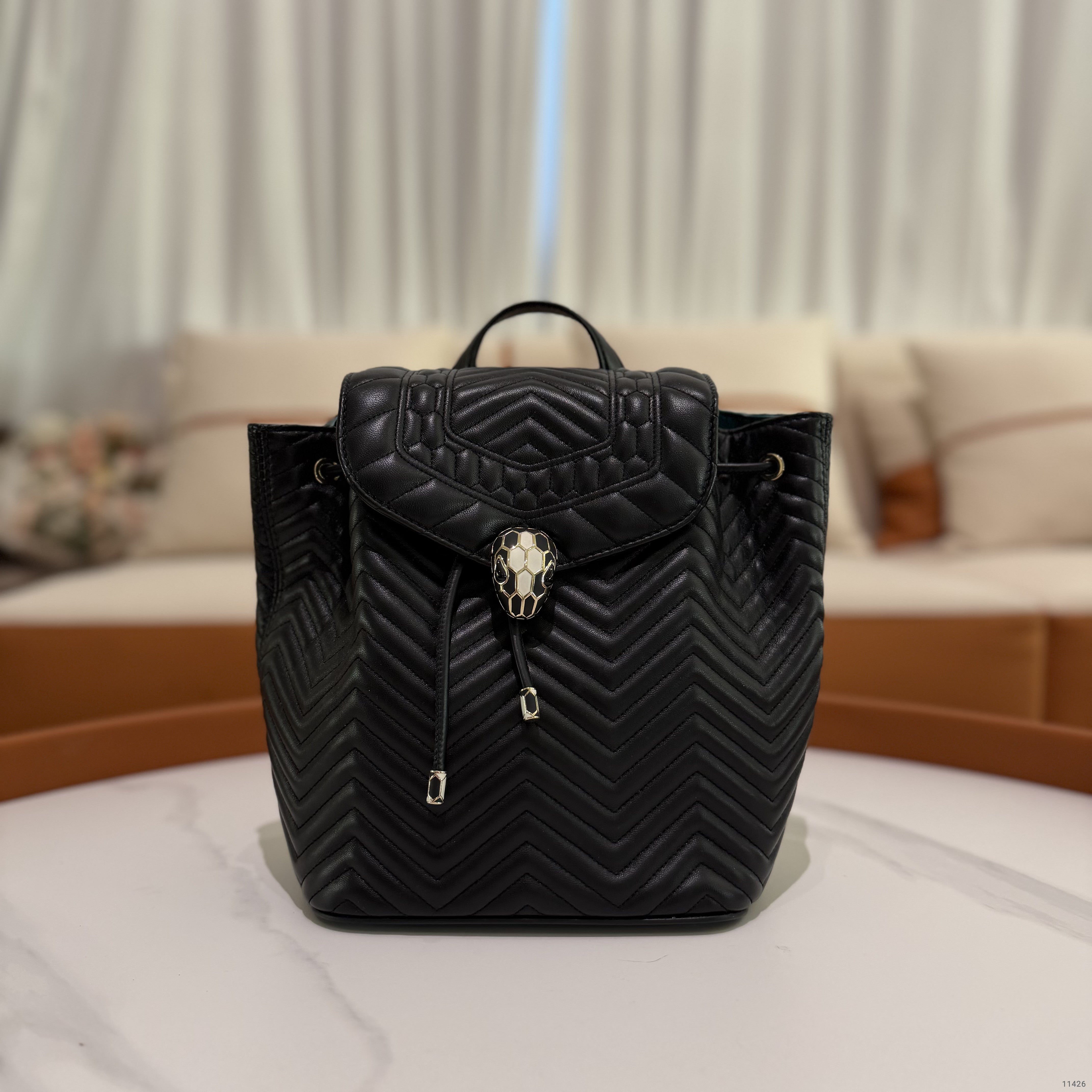 Bvlgari Serpenti Forever Black V-Quilted Enamel Snakehead Backpack