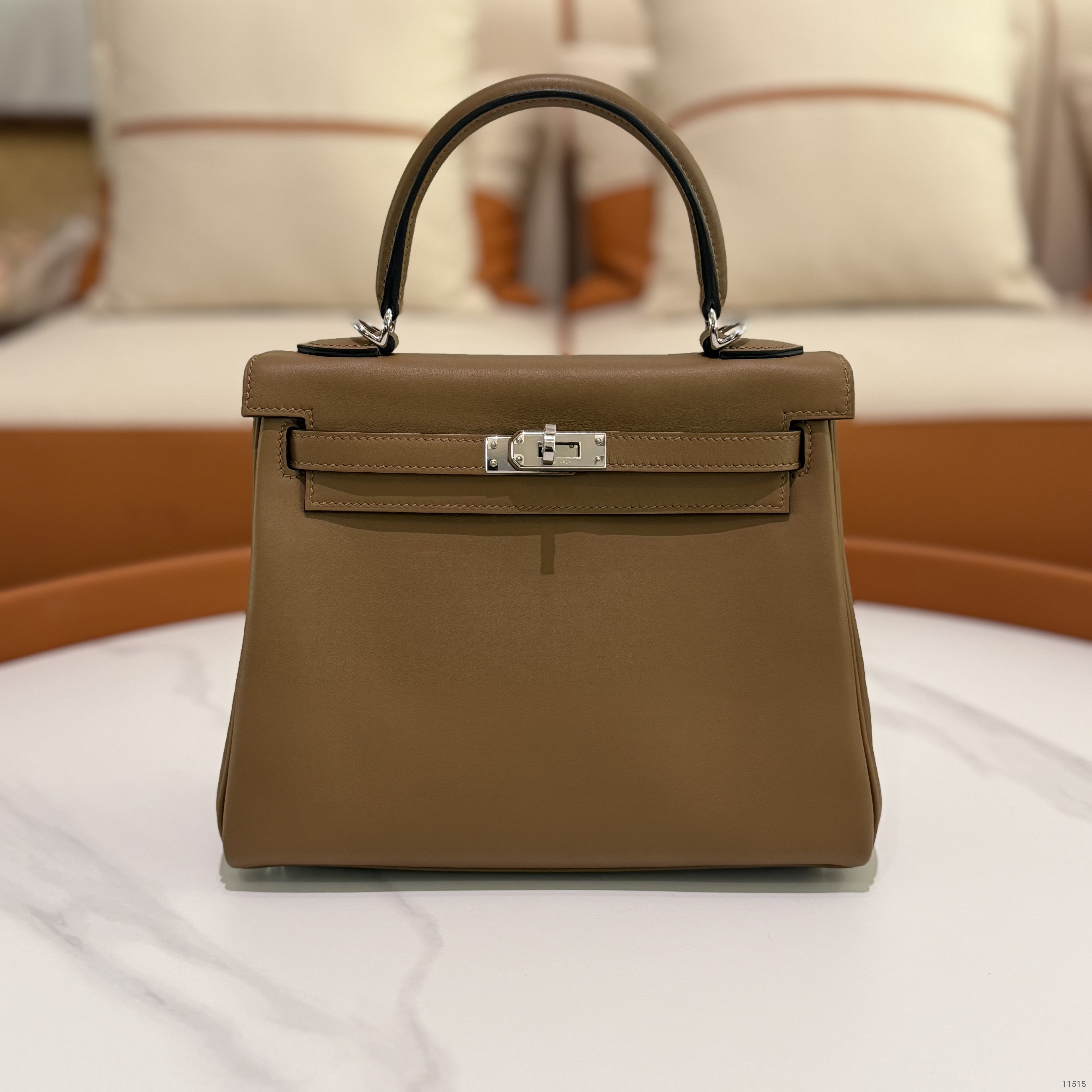 Hermes Kelly 25 Alezan/Beige Swift Leather with Silver Hardware (Stamp W)