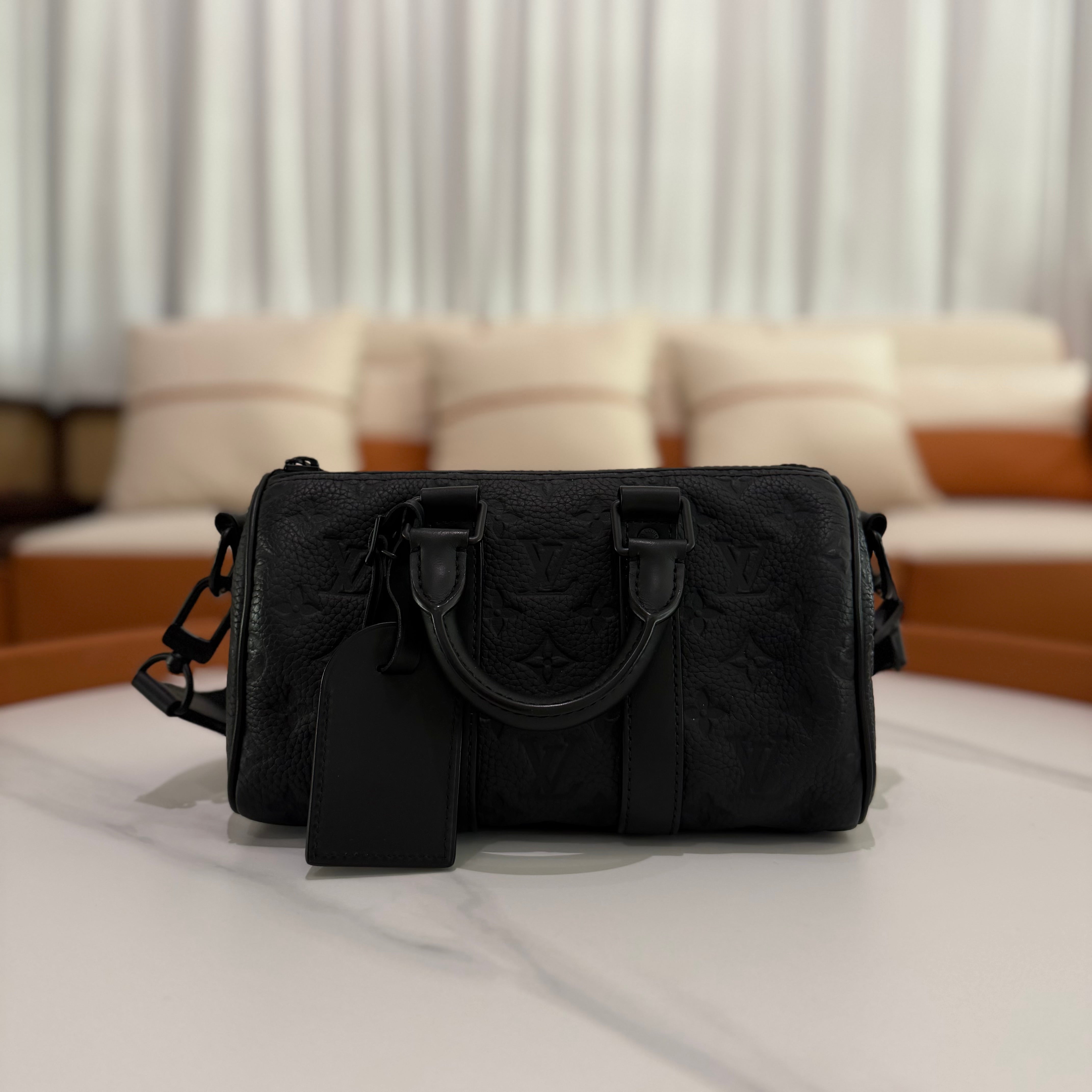 Louis Vuitton Keepall 25 Black Monogram Embossed Leather