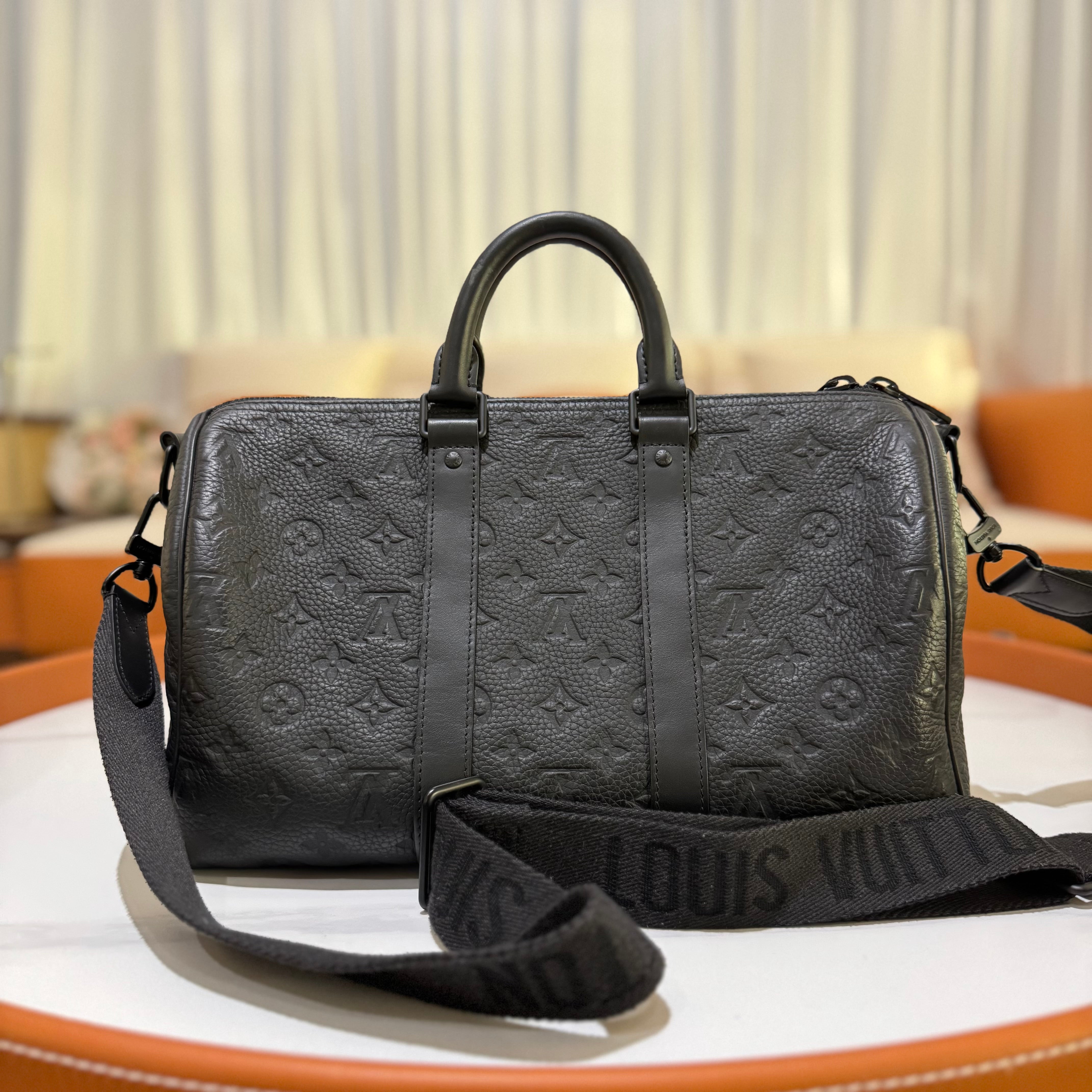 LOUIS VUITTON KEEPALL 35 EMBOSSED SHOULDER & CROSSBODY BAG