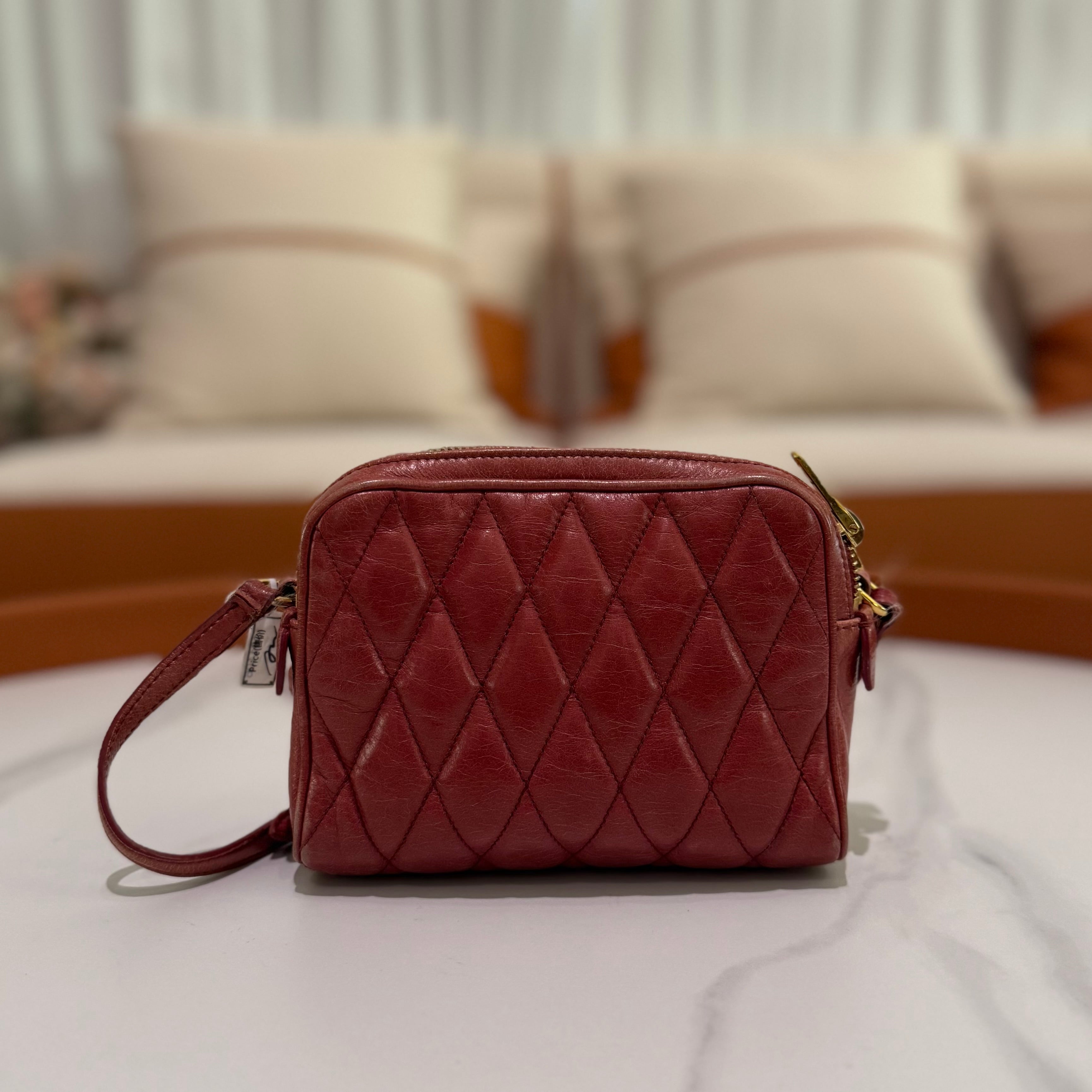 MIU MIU BRICK RED QUILTED BOX CAMERA BAG IN OILED CALFSKIN