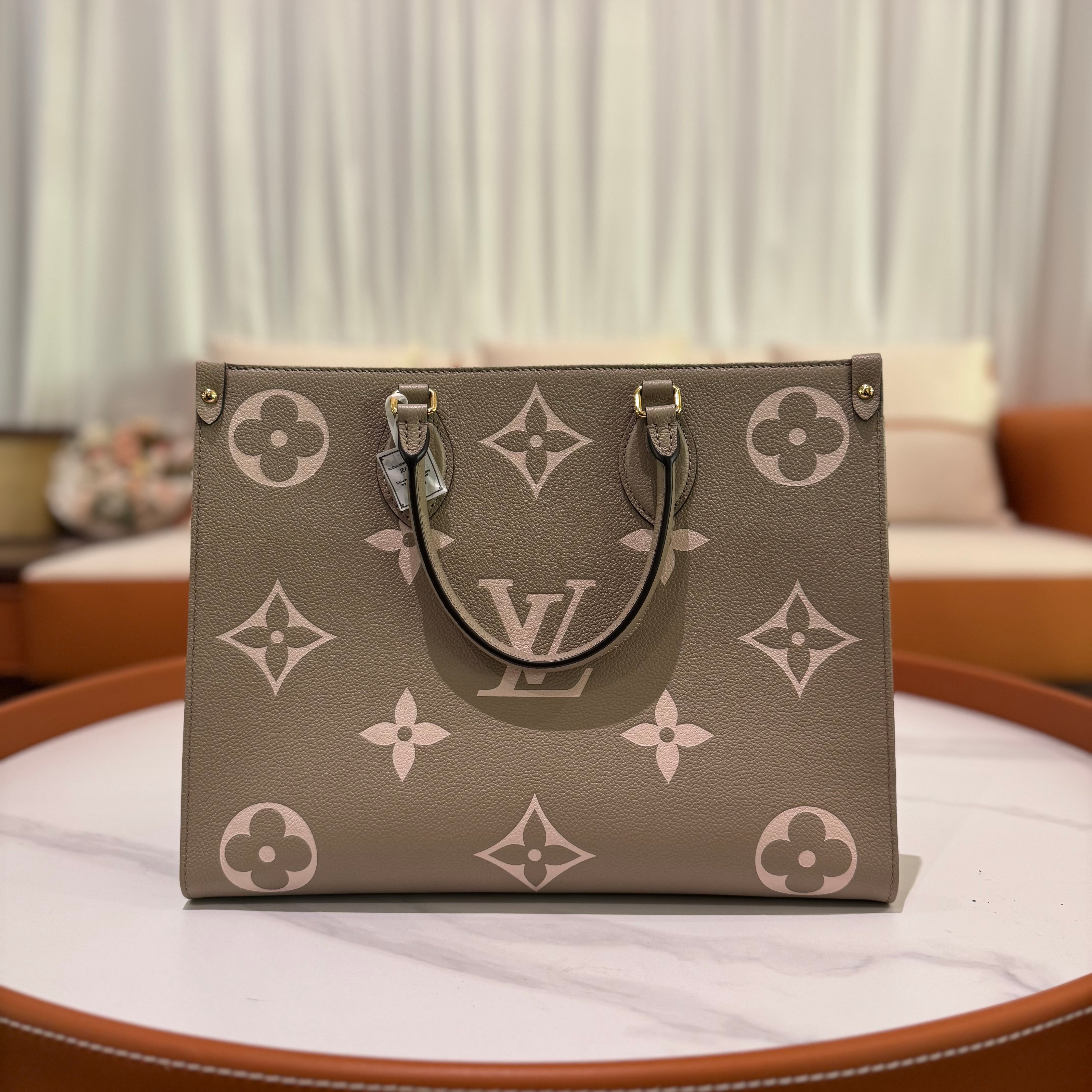 LOUIS VUITTON ON THE GO TOTE BAG MEDIUM ELEPHANT GREY