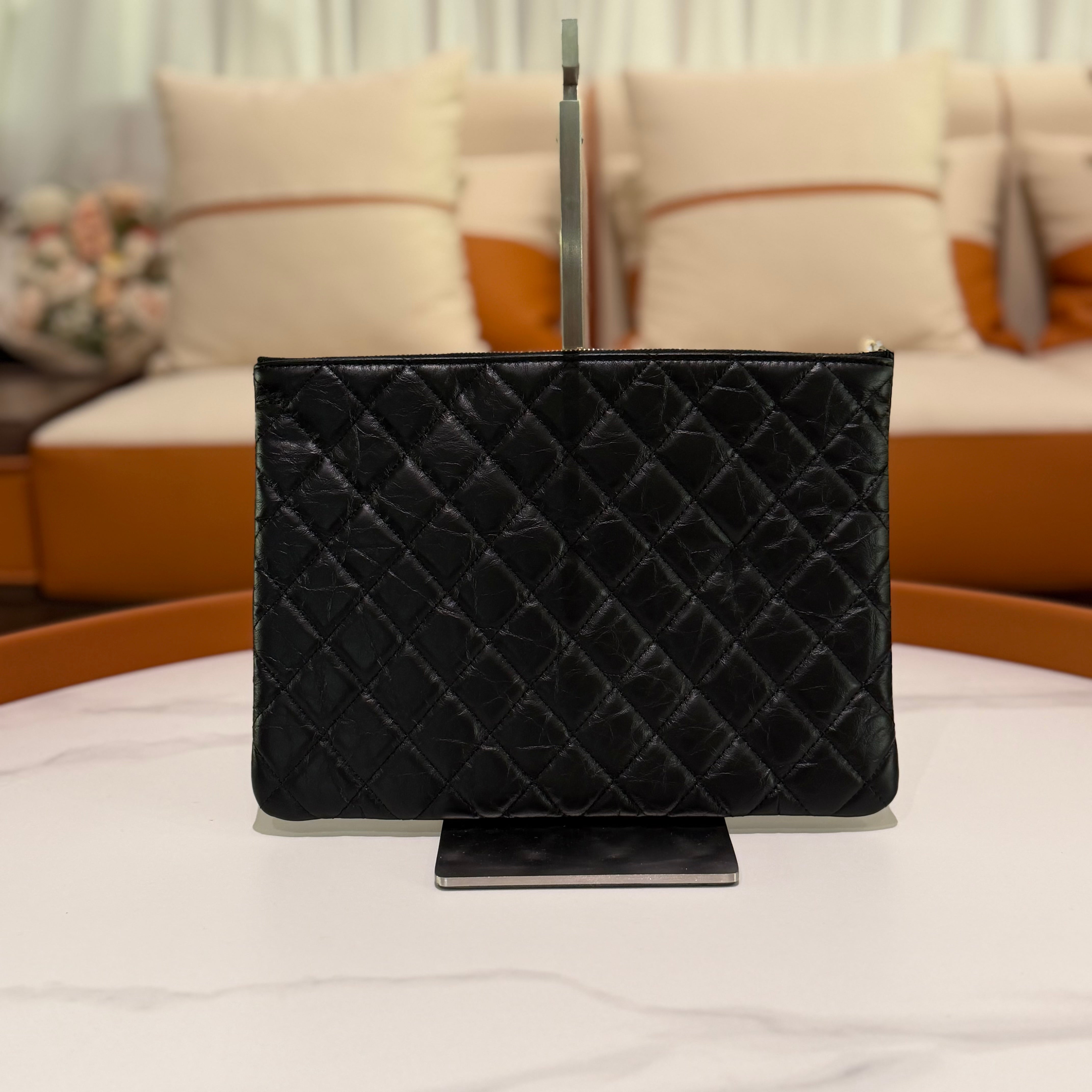 CHANEL Black Quilted Lambskin Limited Edition Badge Clutch