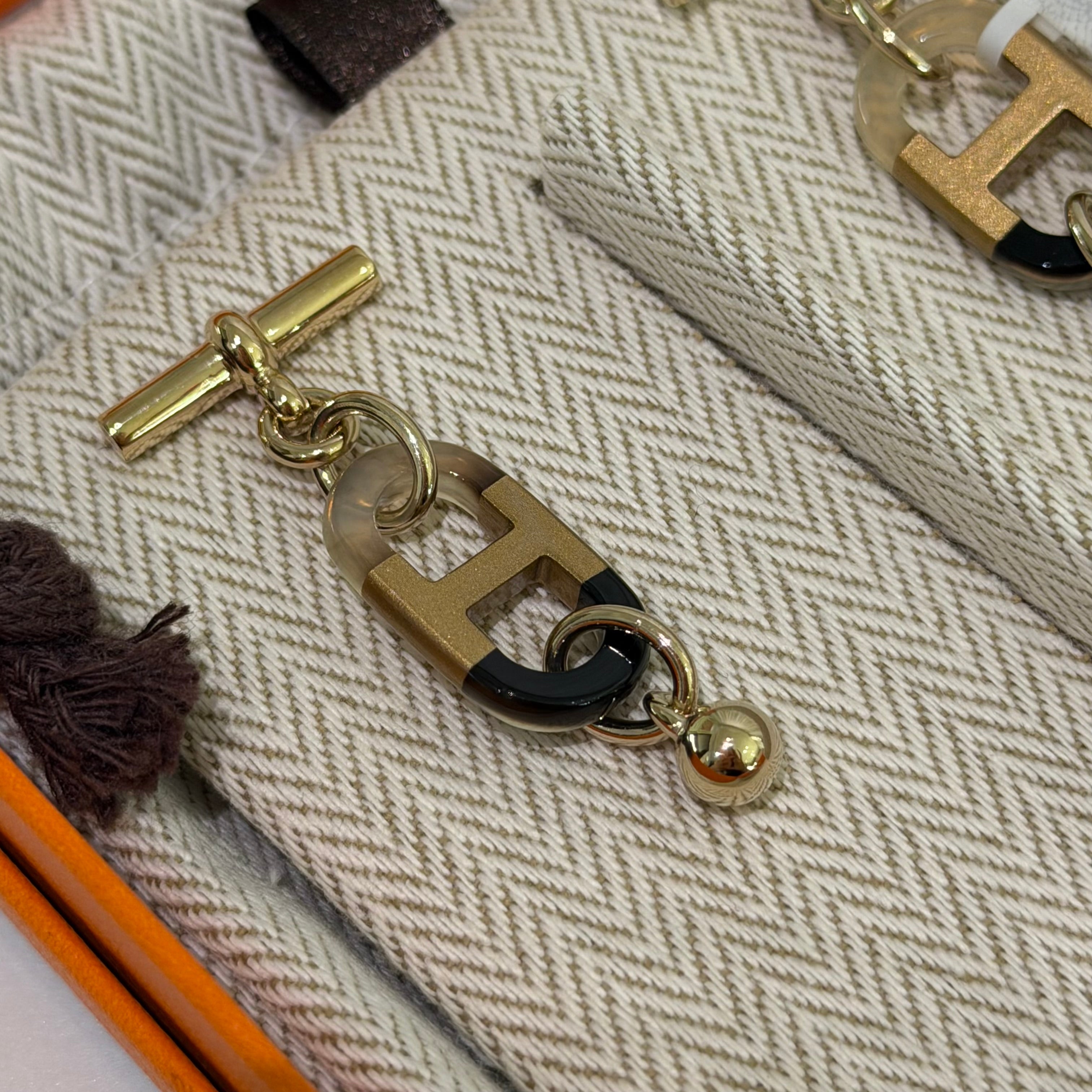 Hermes Sur Mer Buffalo Horn Earrings Black & Gold