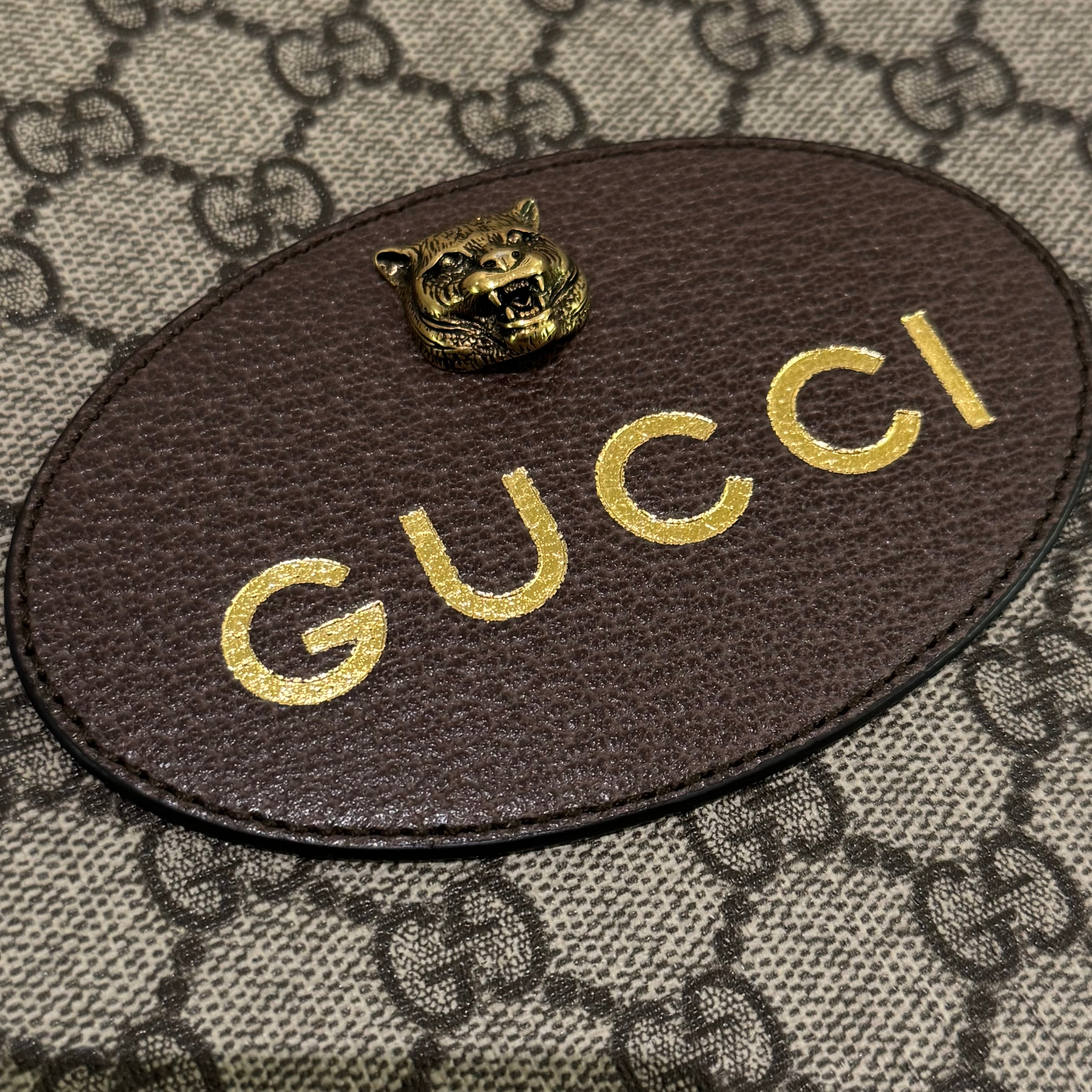 GUCCI METAL TIGER HEAD CLUTCH