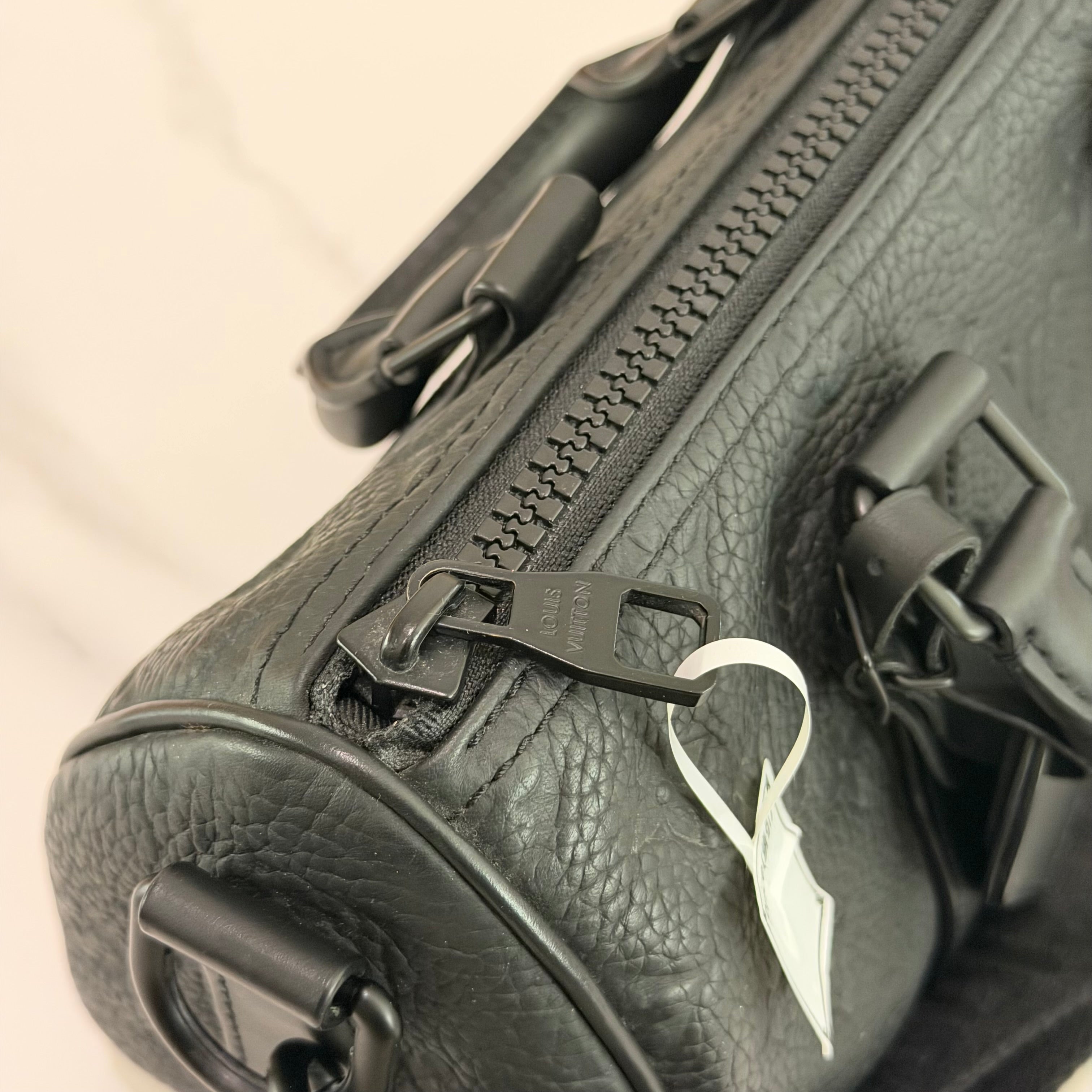 Louis Vuitton Keepall 25 Black Monogram Embossed Leather