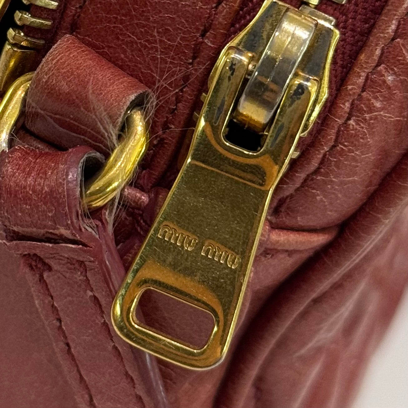 MIU MIU BRICK RED QUILTED BOX CAMERA BAG IN OILED CALFSKIN