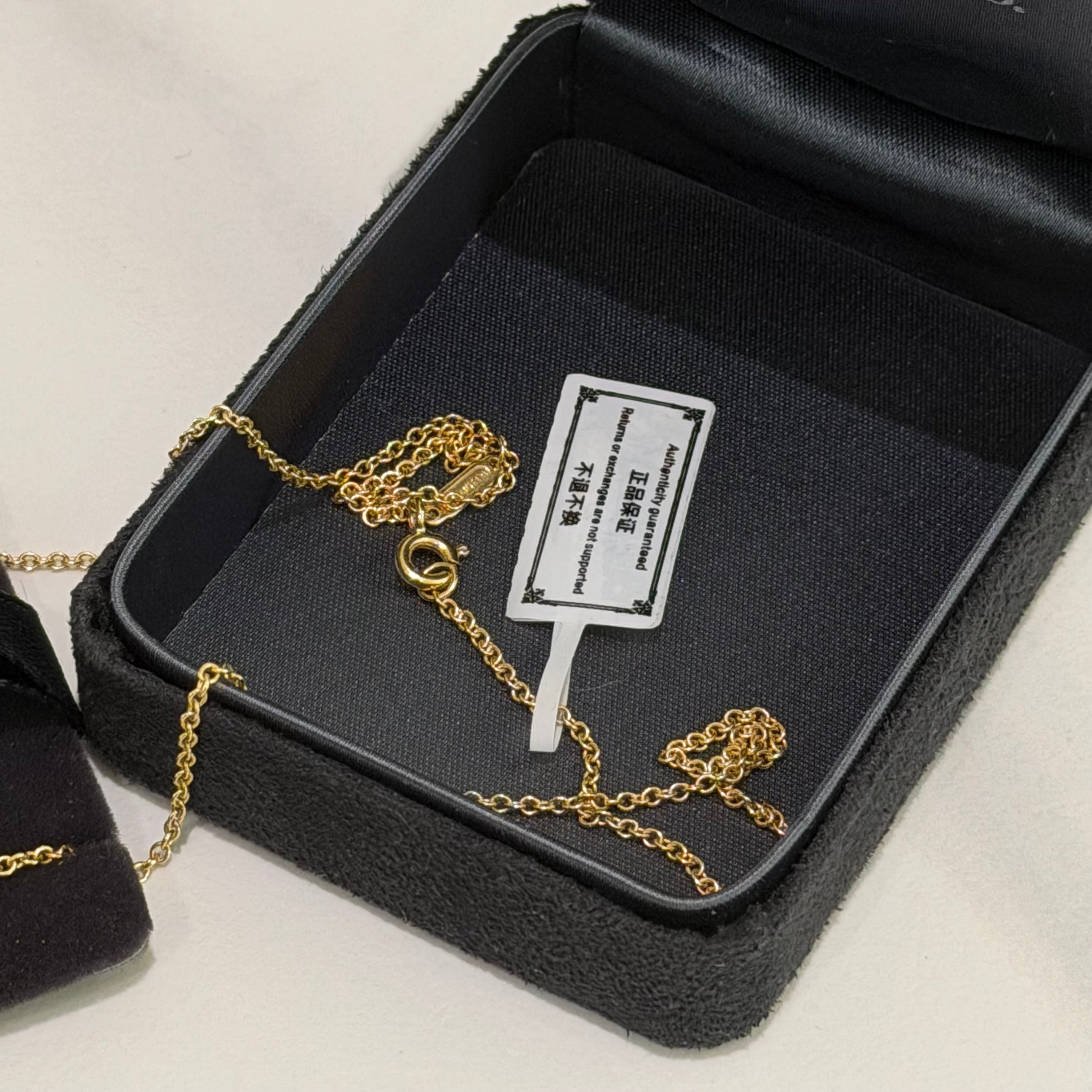 Tiffany & Co. Knot 18K Gold Single-Row Diamond Double-Ring Pendant Necklace