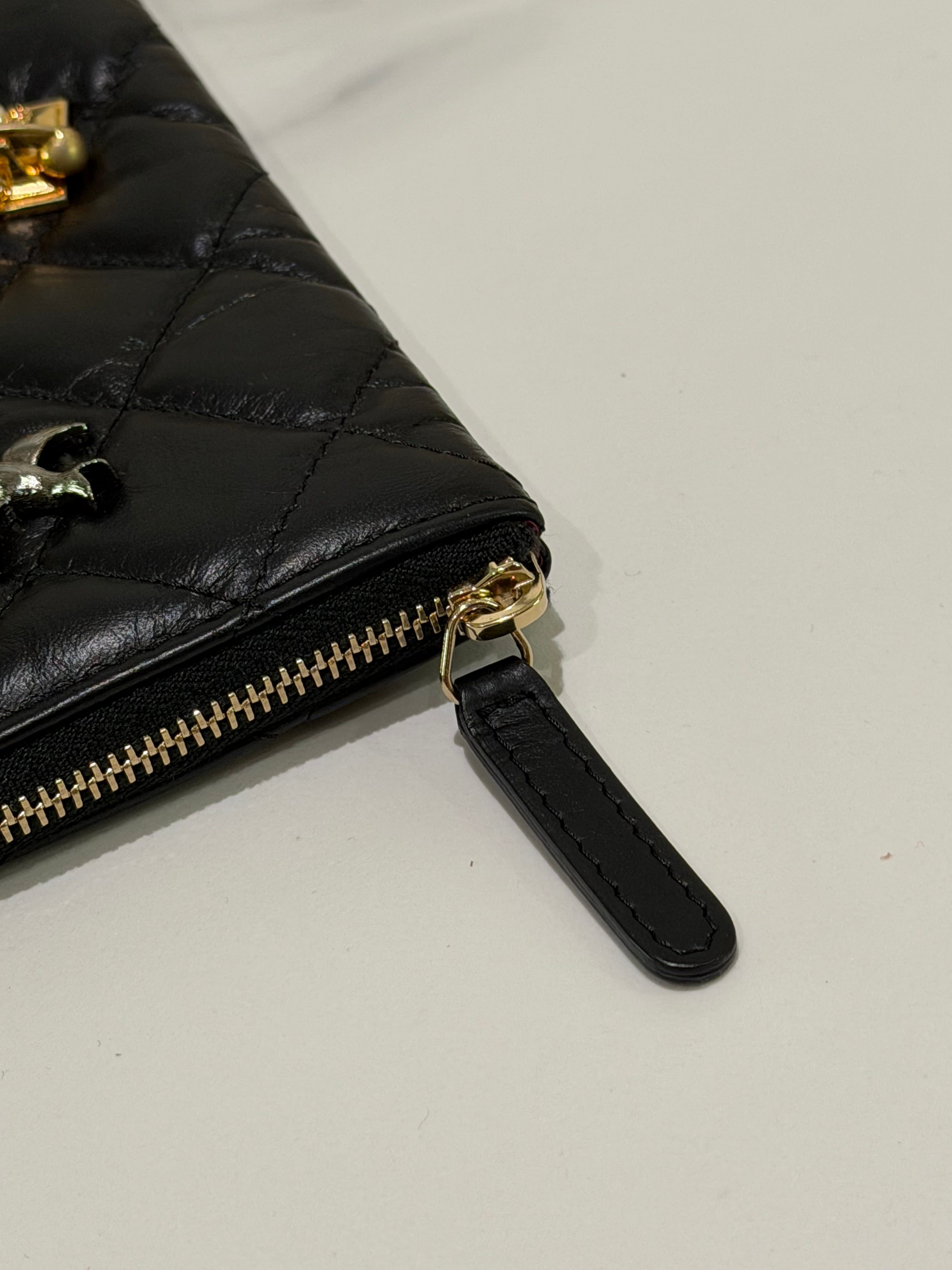 CHANEL Black Quilted Lambskin Limited Edition Badge Clutch