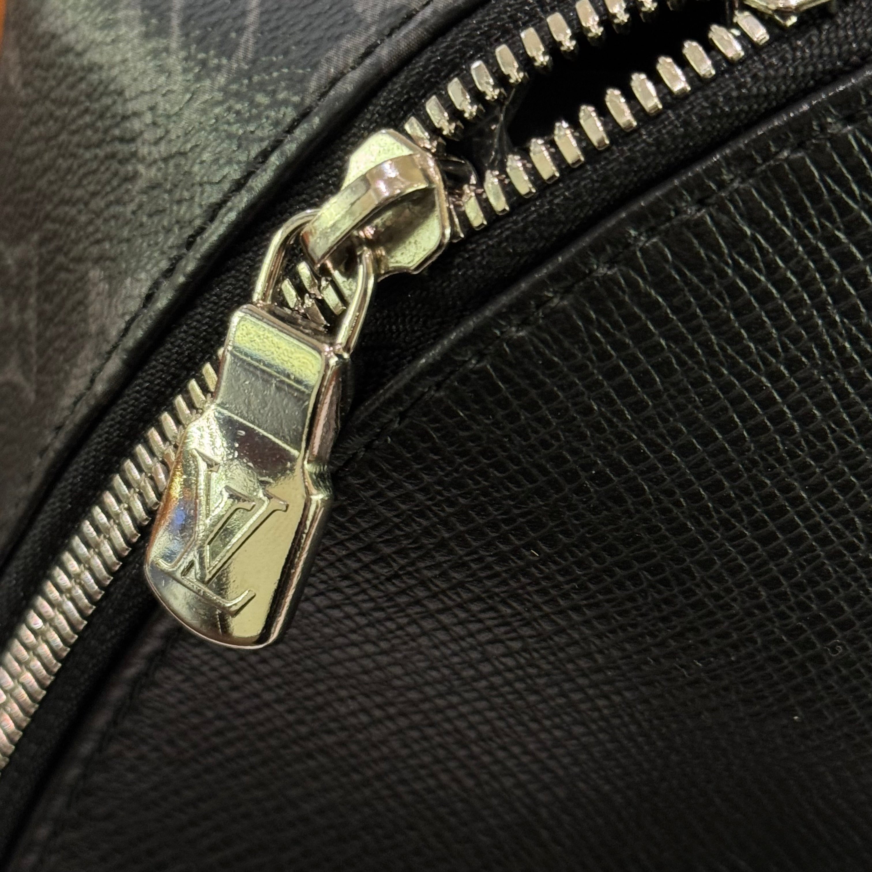 LOUIS VUITTON DISCOVERY BACKPACK APOLLO MONOGRAM ECLIPSE WITH LEATHER TRIM (CHIP VERSION)