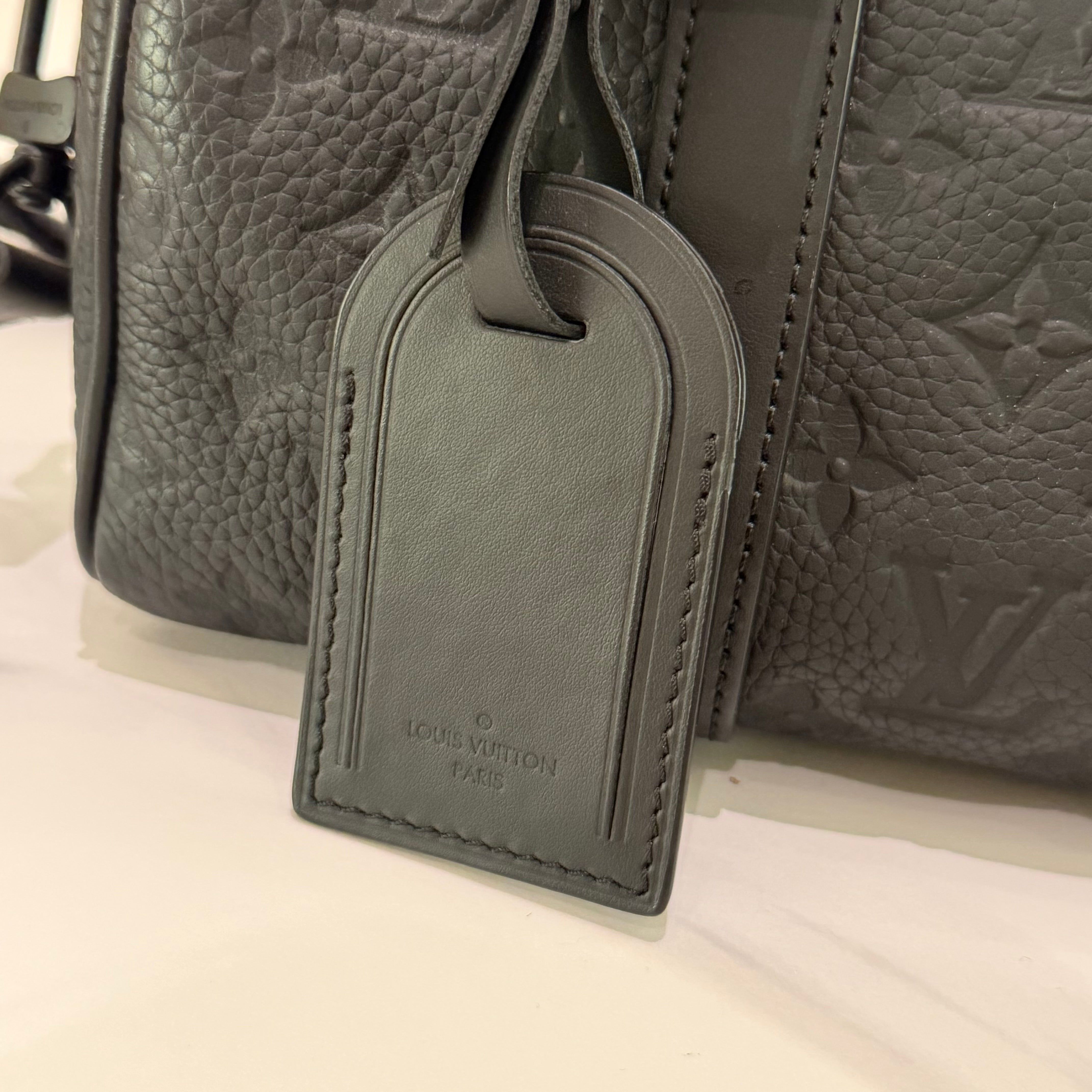 Louis Vuitton Keepall 25 Black Monogram Embossed Leather