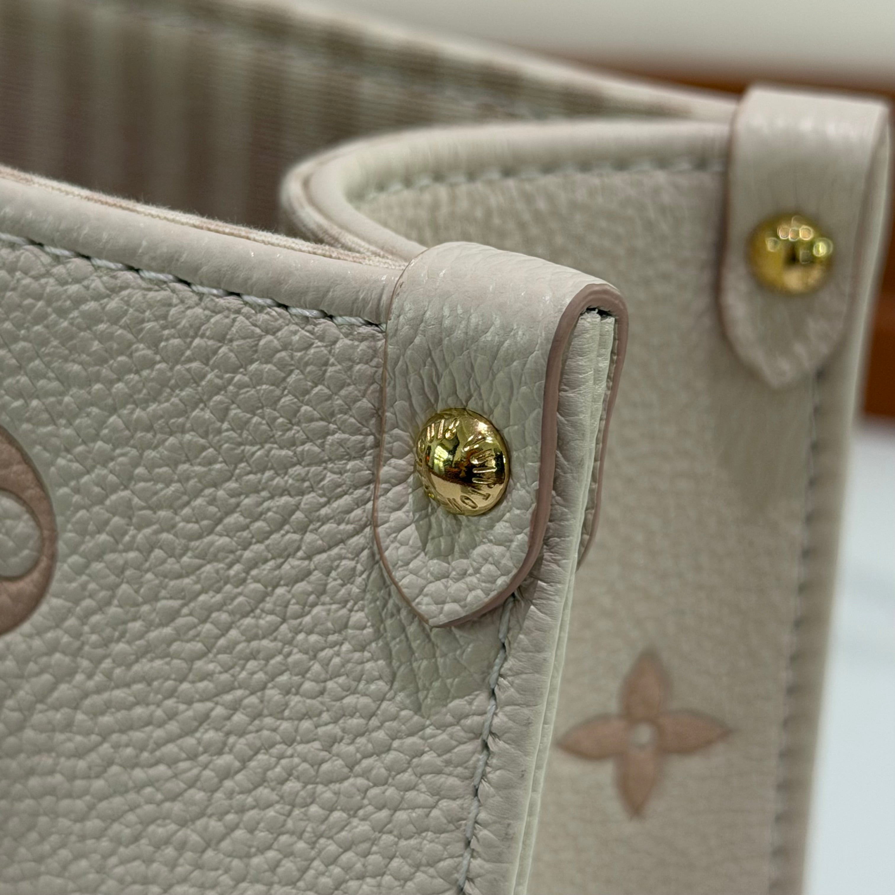 Louis Vuitton Onthego PM Almond Pink Monogram Empreinte Leather (Chip Model)