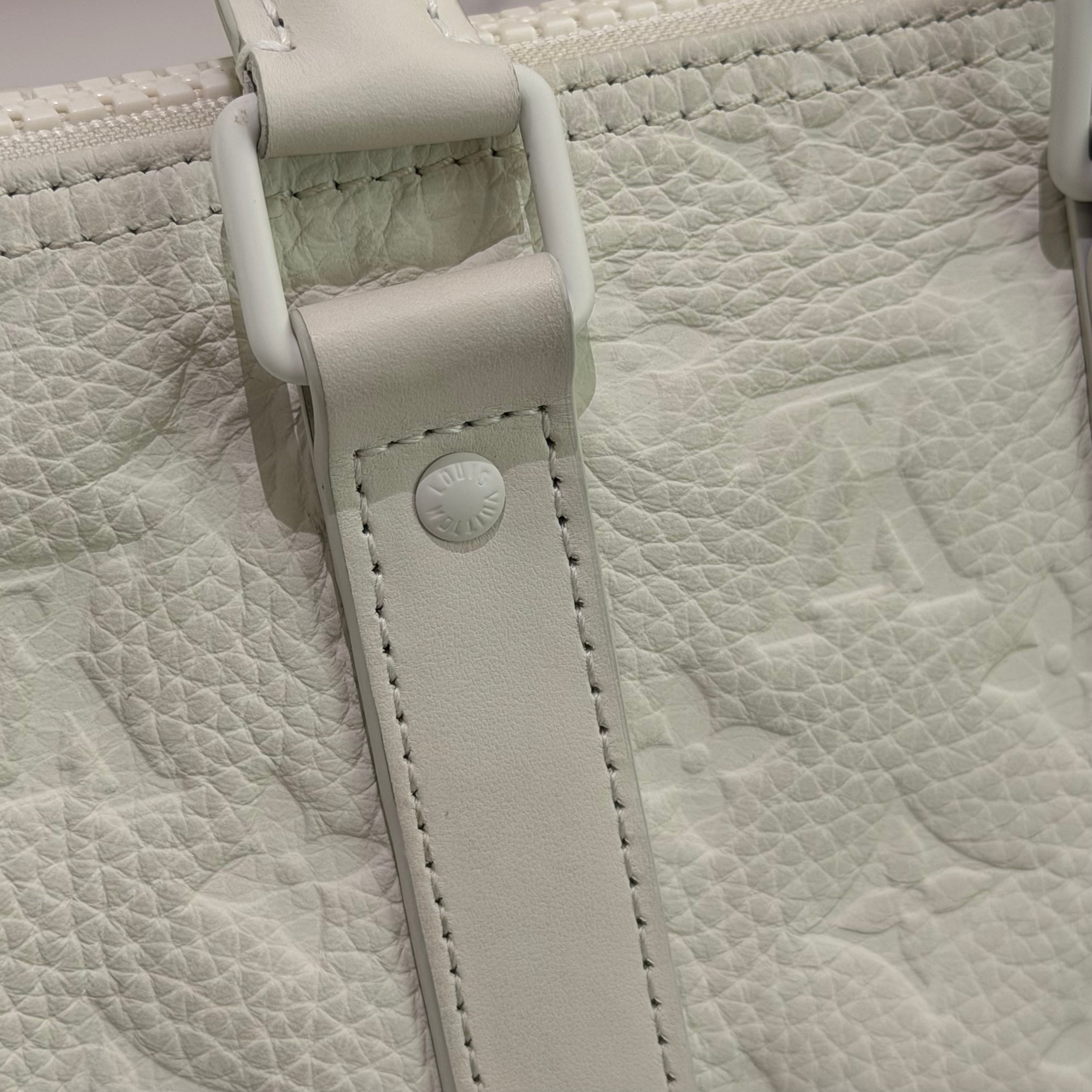 Louis Vuitton Keepall 25 White Embossed Monogram Top Handle Shoulder Bag | LOUIS VUITTON