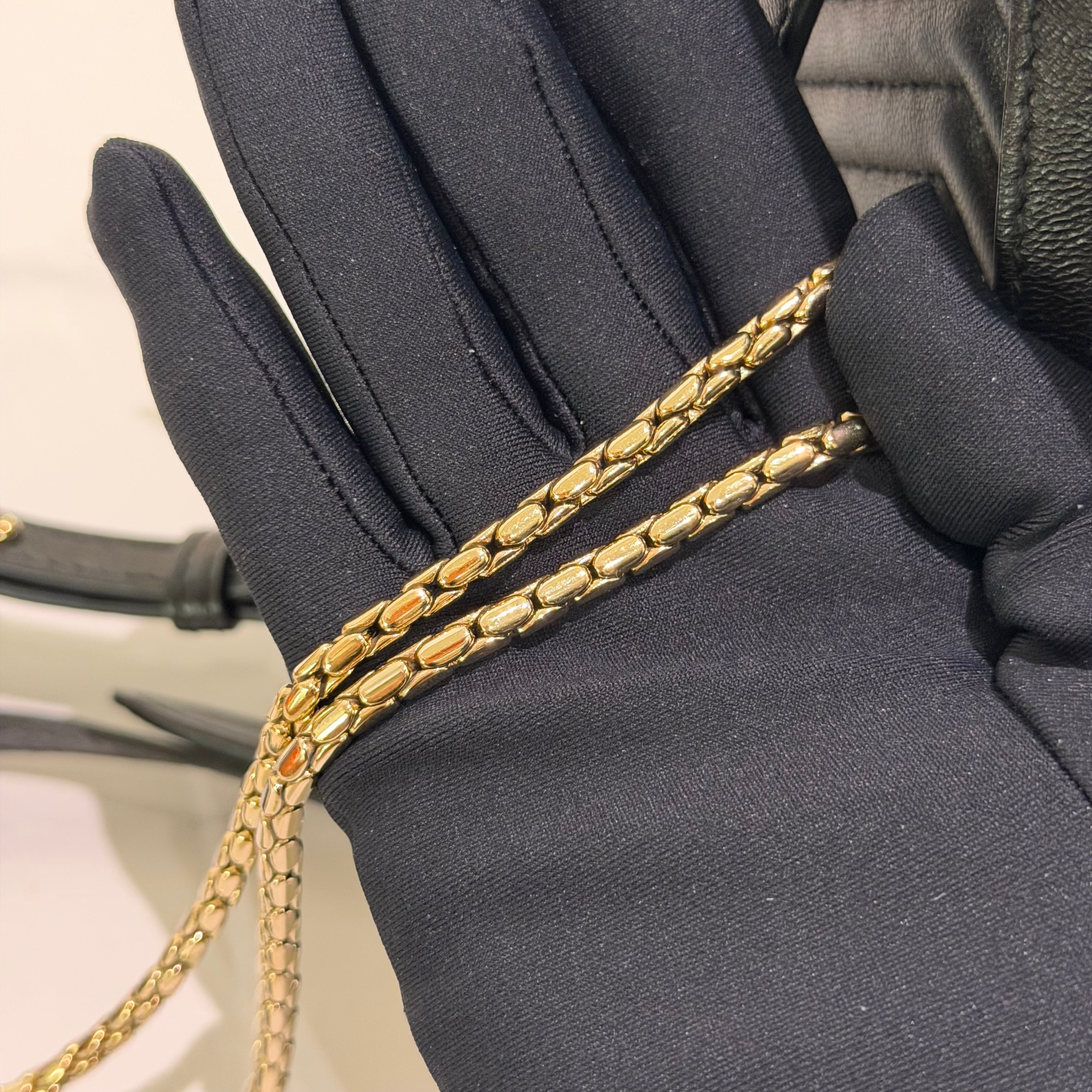 Bvlgari Serpenti Forever Black V-Quilted Enamel Snakehead Backpack | BVLGARI
