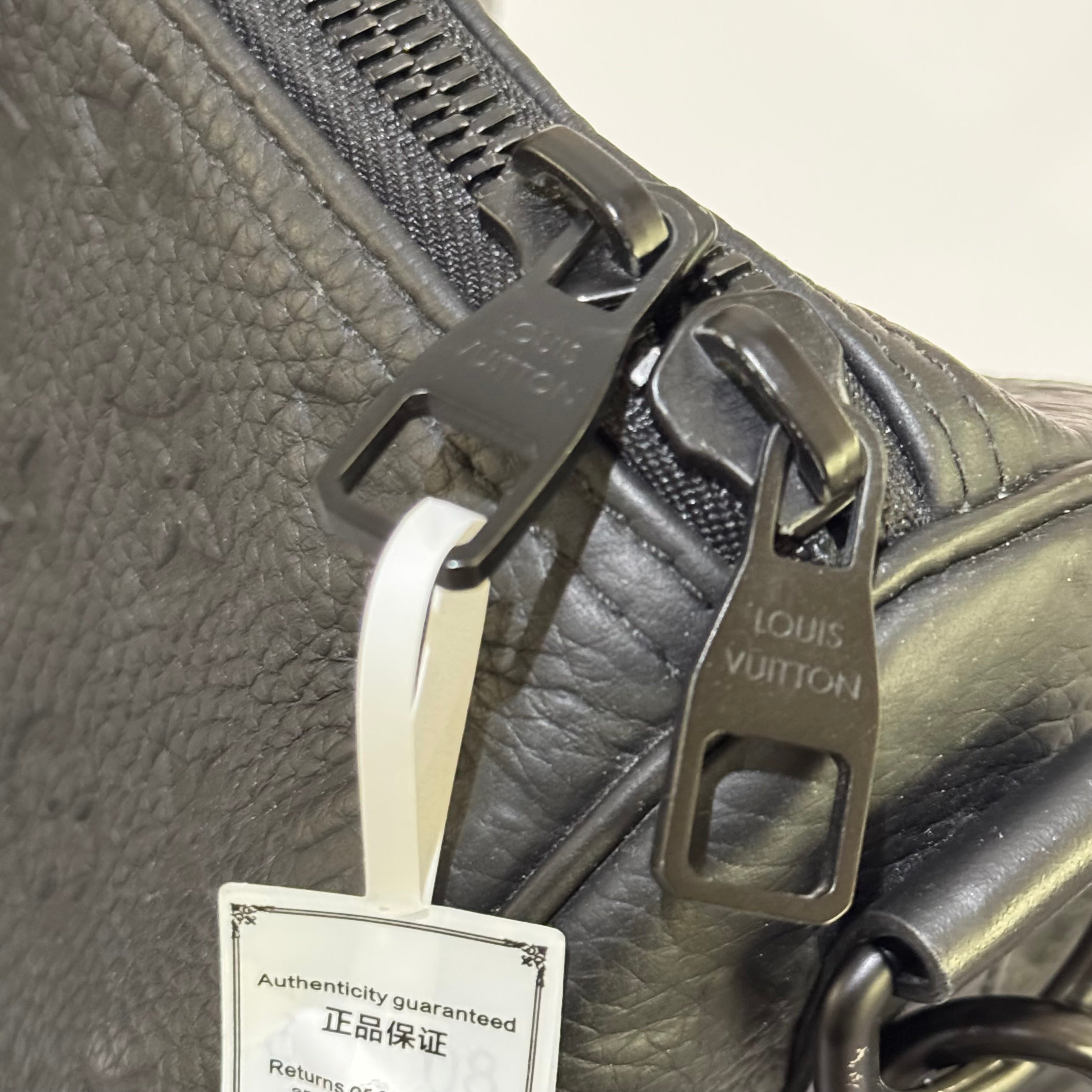 LOUIS VUITTON KEEPALL 35 EMBOSSED SHOULDER & CROSSBODY BAG