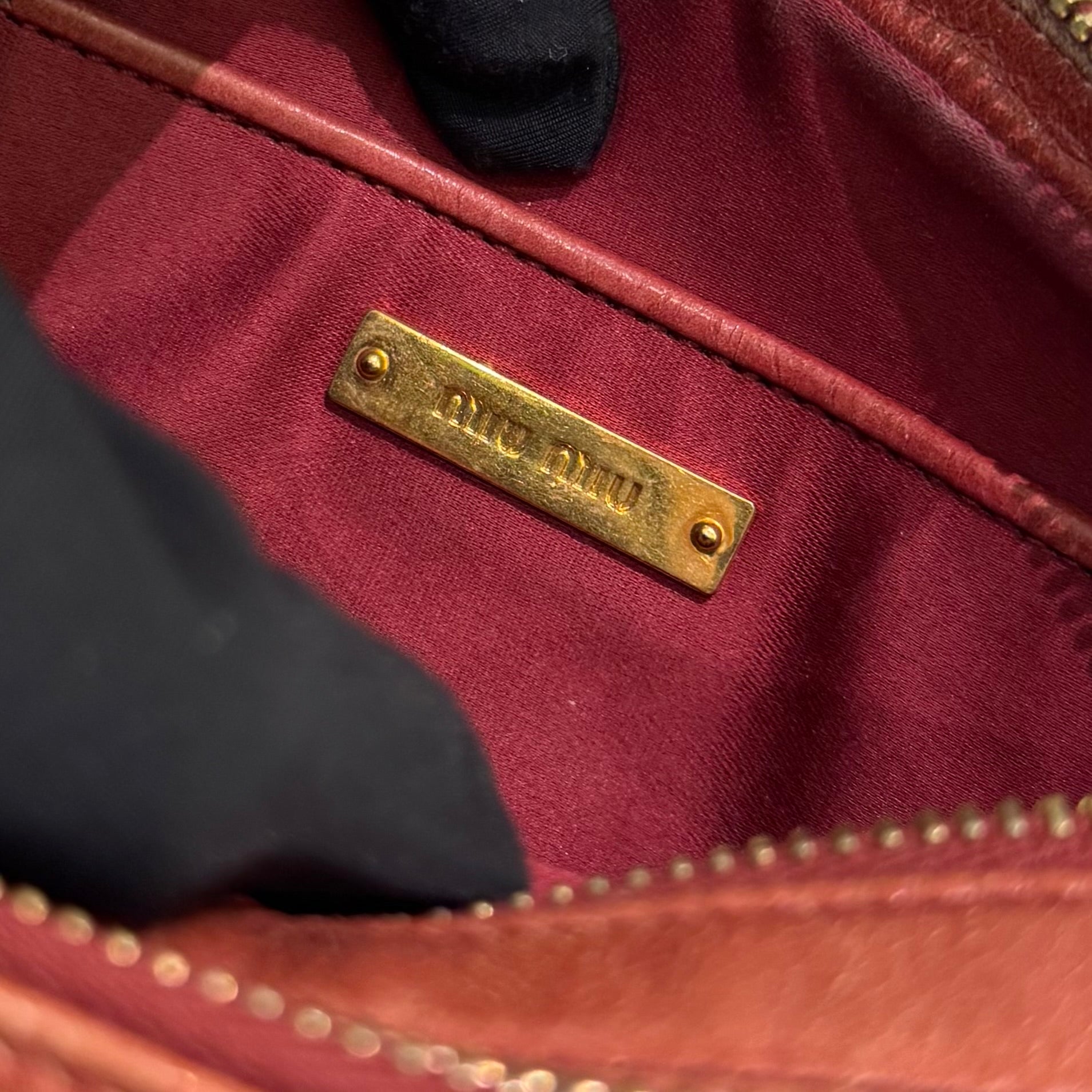 MIU MIU BRICK RED QUILTED BOX CAMERA BAG IN OILED CALFSKIN