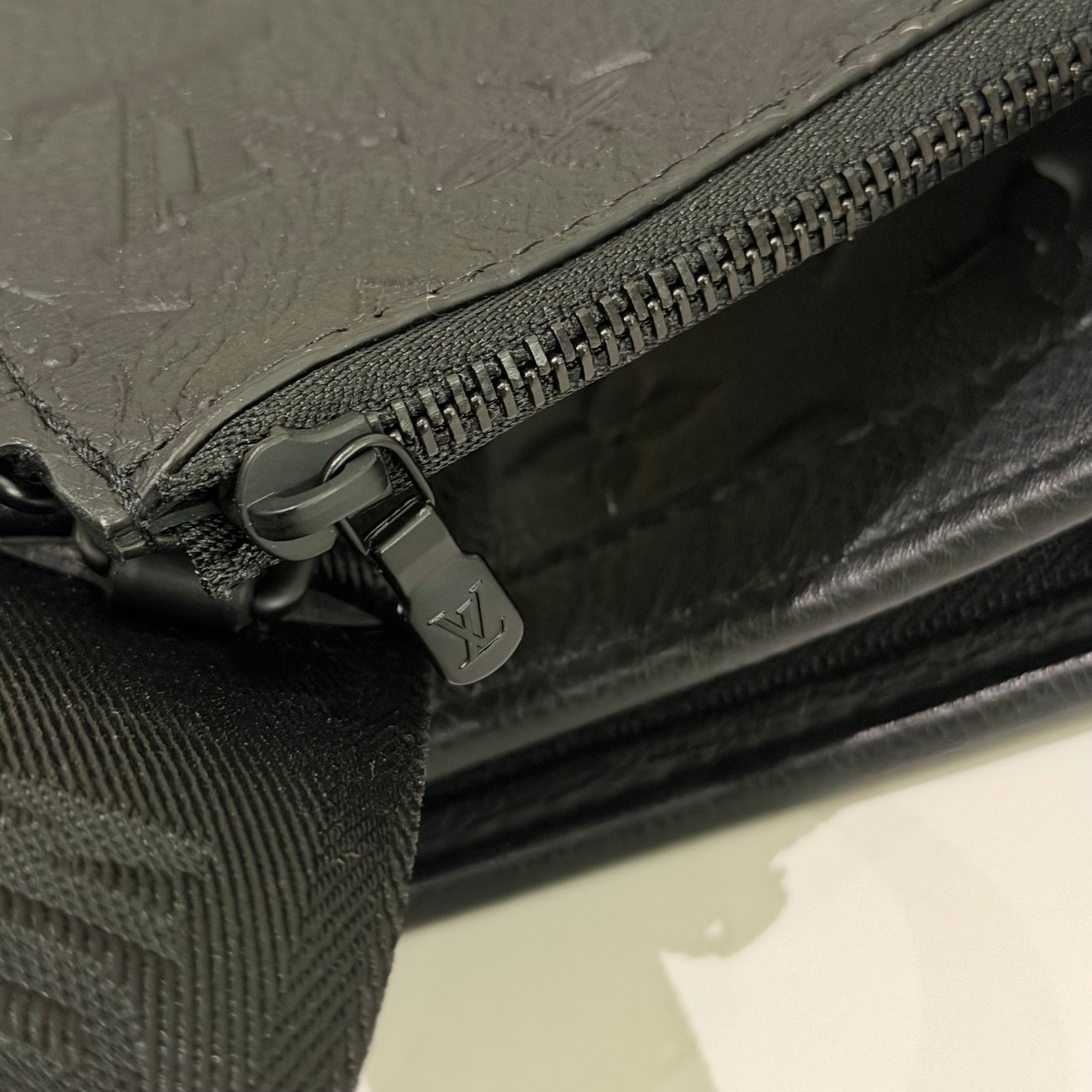 Louis Vuitton Gaston Wearable Wallet Embossed Leather Crossbody Bag