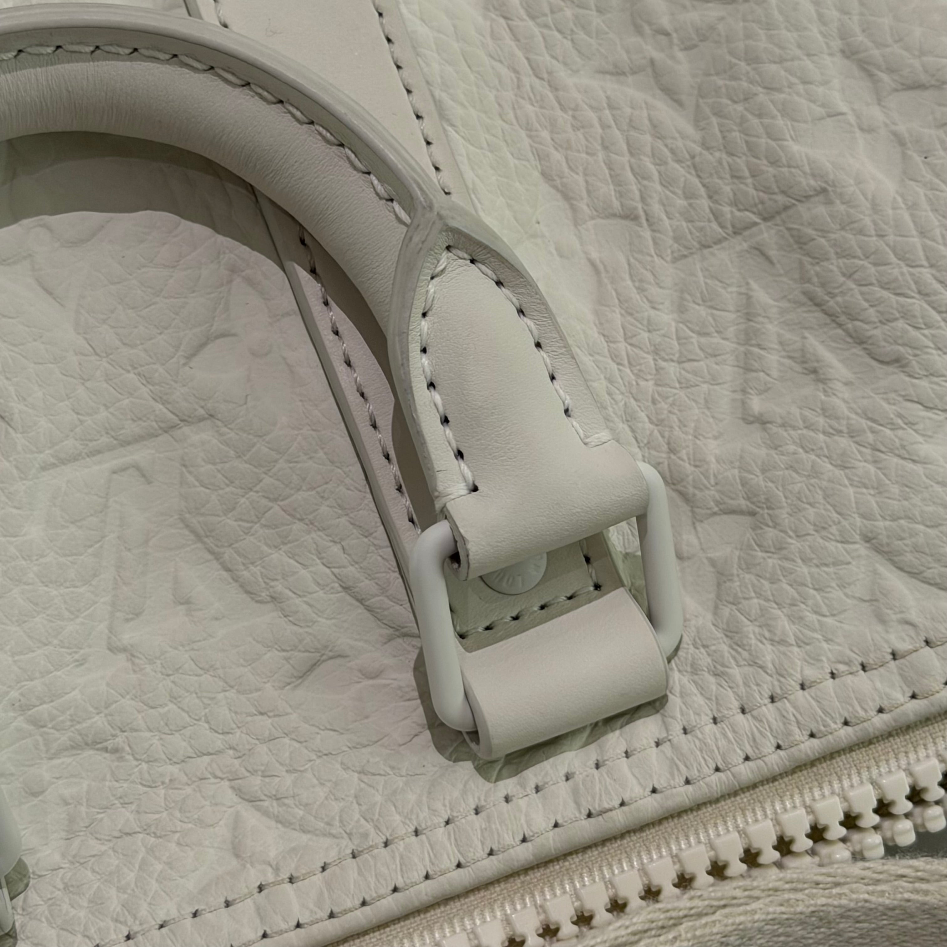 Louis Vuitton Keepall 25 White Embossed Monogram Top Handle Shoulder Bag | LOUIS VUITTON