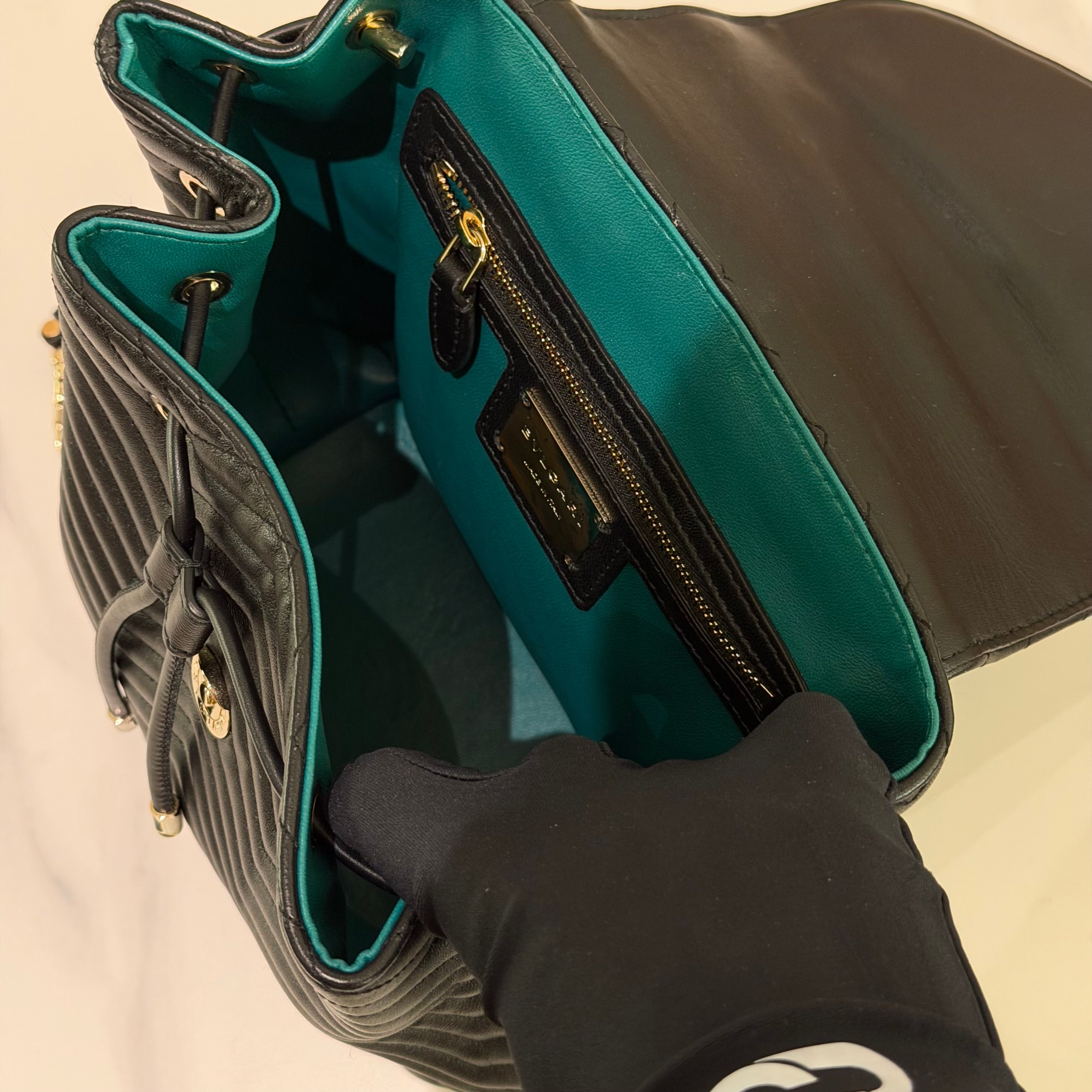 Bvlgari Serpenti Forever Black V-Quilted Enamel Snakehead Backpack | BVLGARI