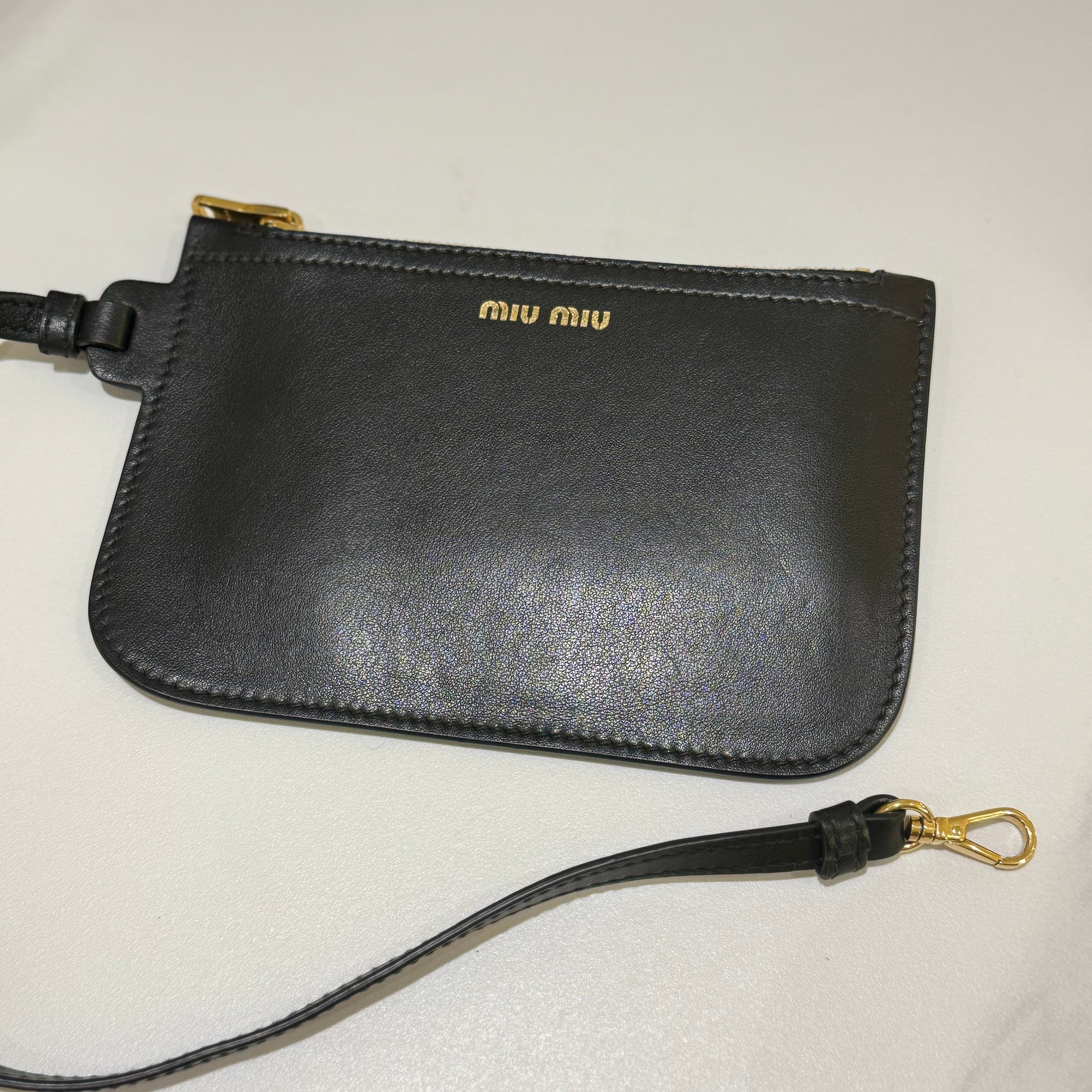 MIUMIU BLACK FLOWER BUCKET BAG | COLLINS RAIN