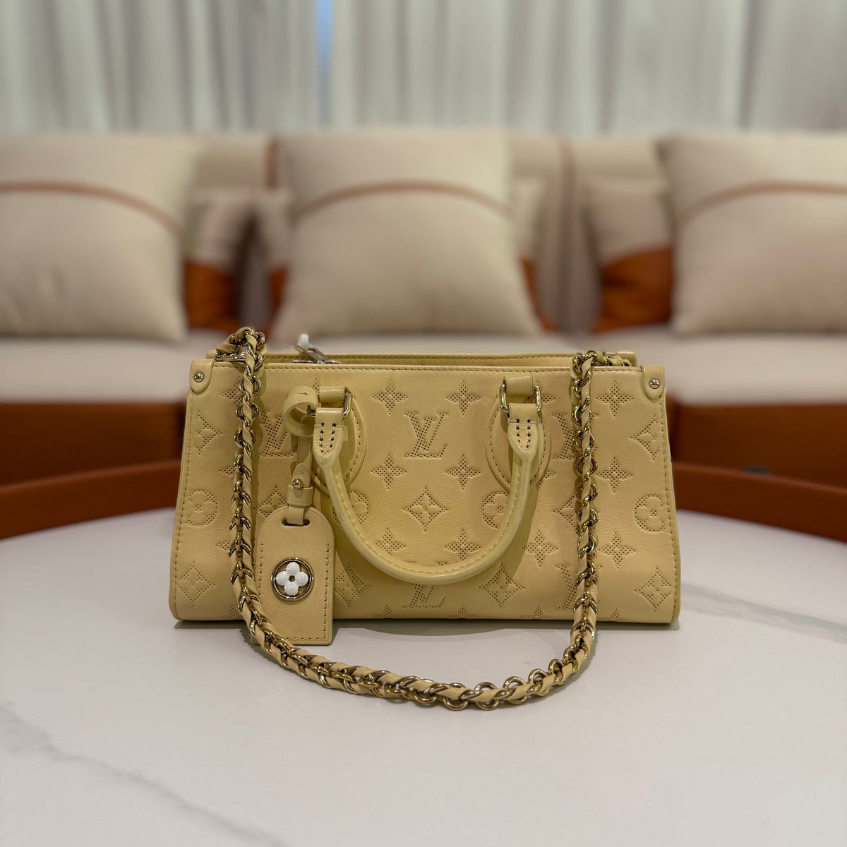 Louis Vuitton Onthego East West Cream Yellow Monogram Embossed Tote | LOUIS VUITTON