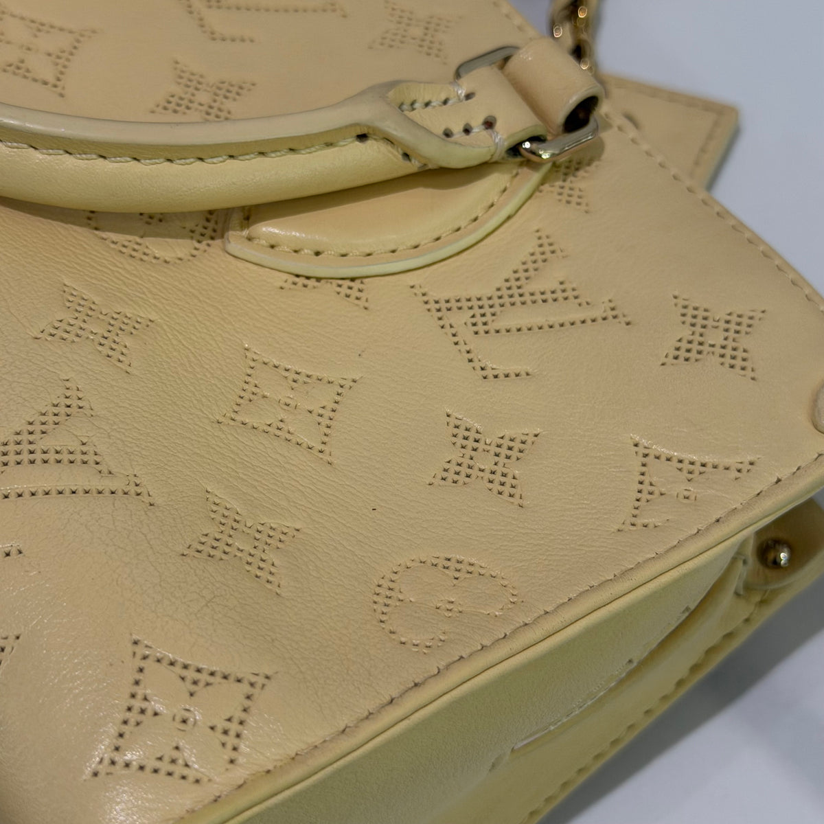 Louis Vuitton Onthego East West Cream Yellow Monogram Embossed Tote | LOUIS VUITTON