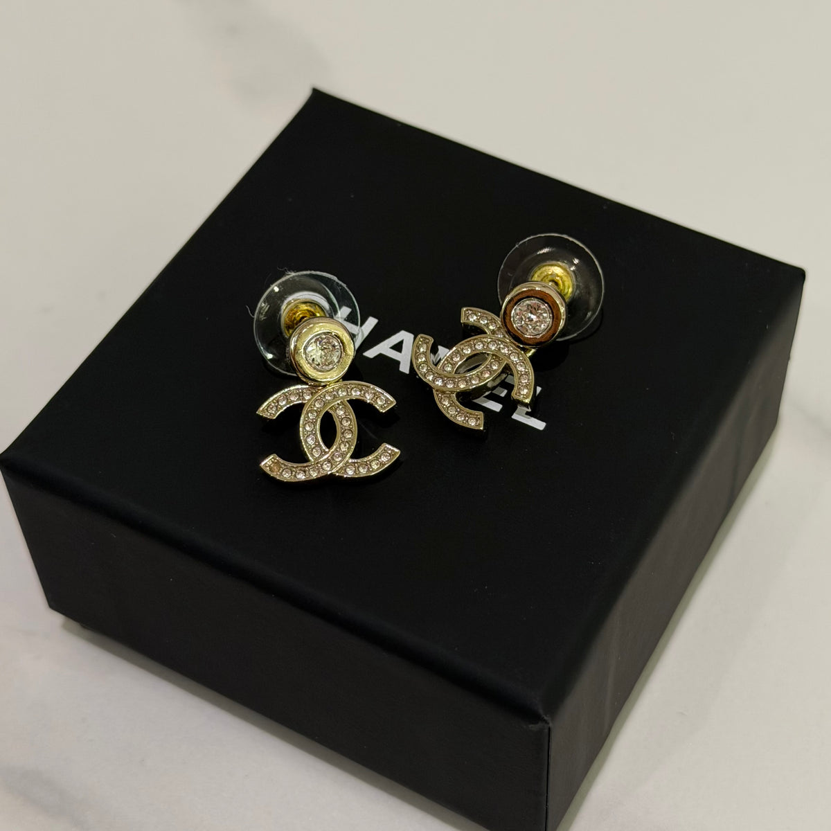 Chanel Gold-Tone Crystal Double CC Dangle Earrings | CHANEL
