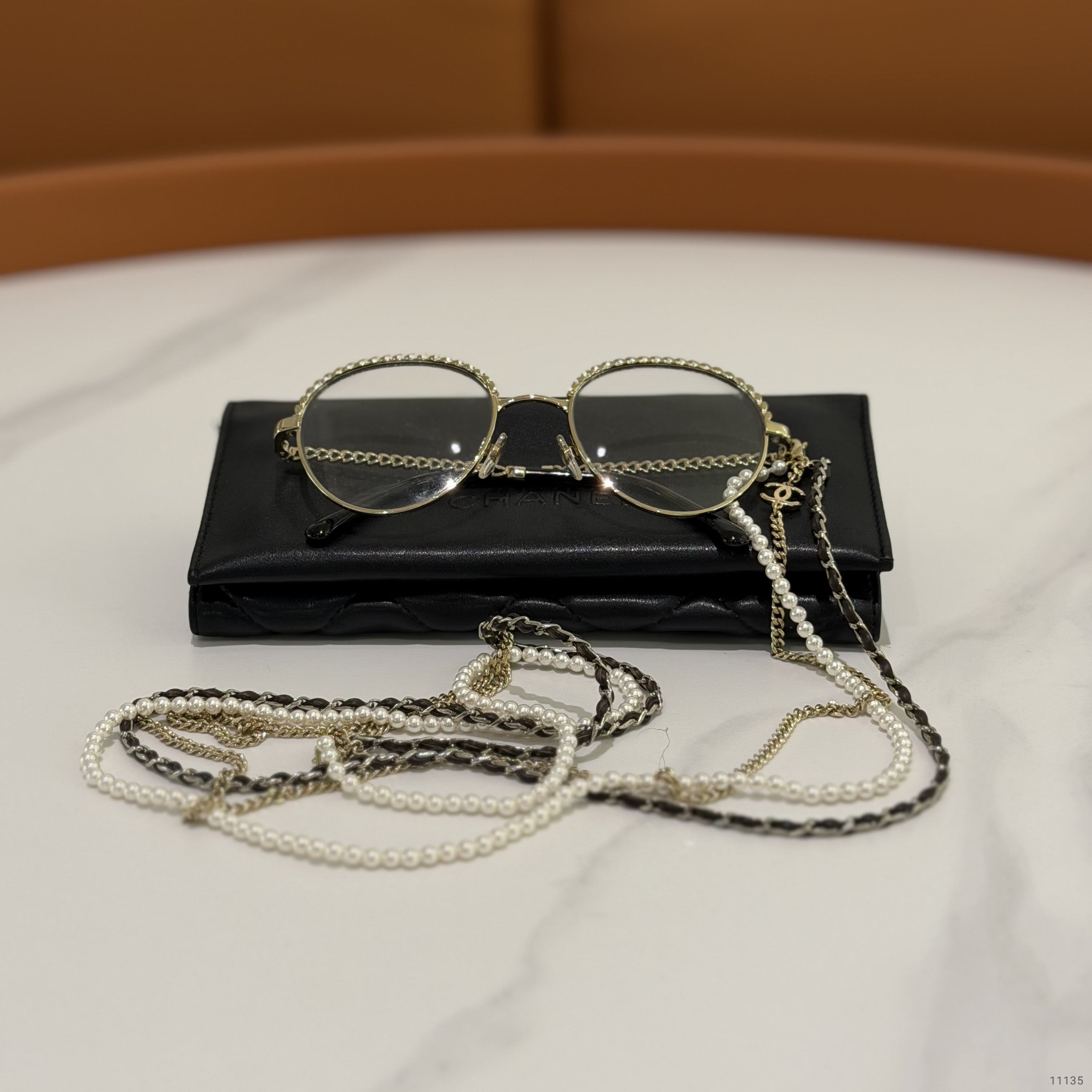 CHANEL BLACK FLAT GLASSES WITH GOLD PEARL CHAIN