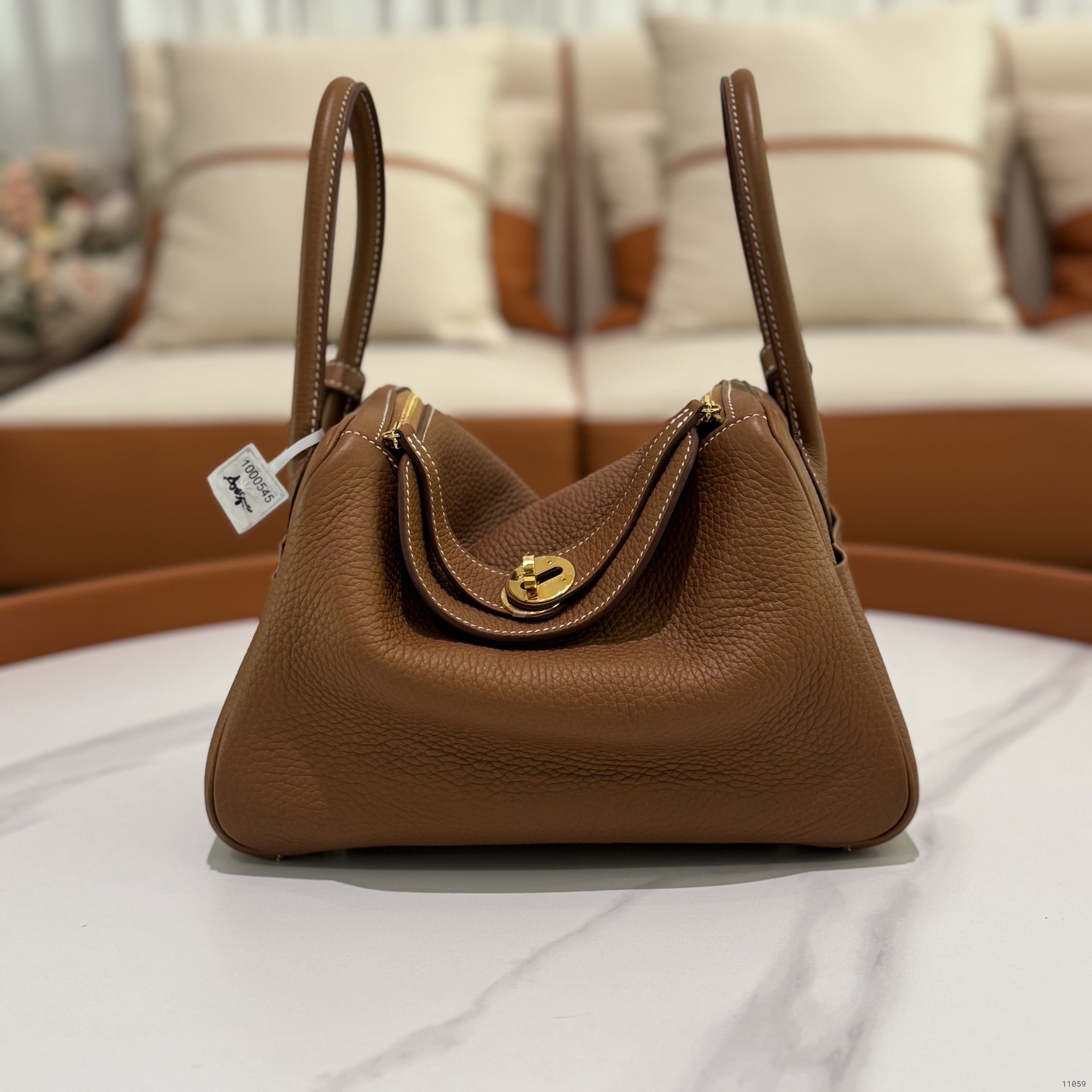 HERMÈS LINDY 26 BROWN WITH GOLD HARDWARE TC LEATHER