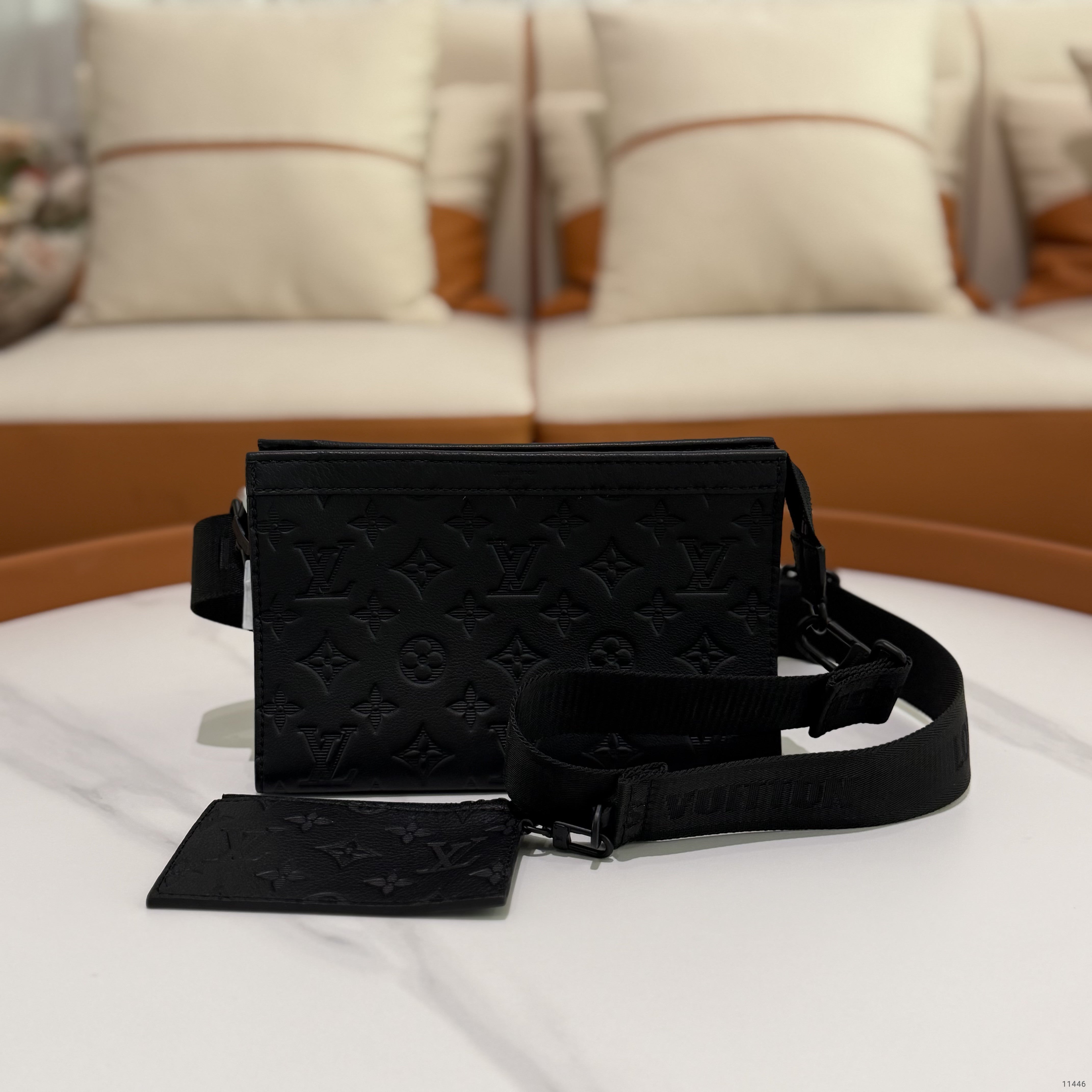 Louis Vuitton Gaston Wearable Wallet Embossed Leather Crossbody Bag