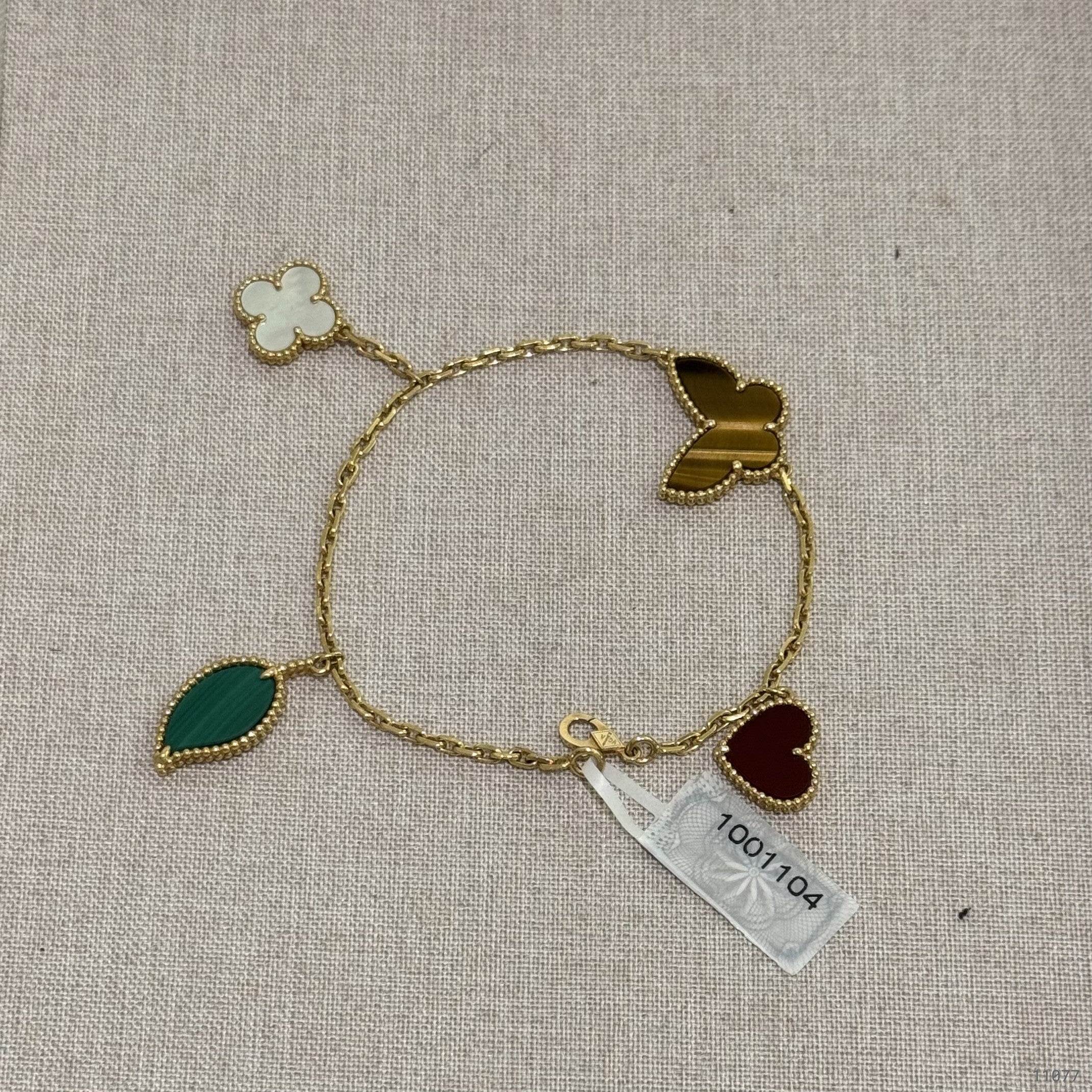VAN CLEEF & ARPELS LUCKY ALHAMBRA BRACELET 18K YELLOW GOLD WITH MOTHER-OF-PEARL, MALACHITE, CARNELIAN & TIGER’S EYE