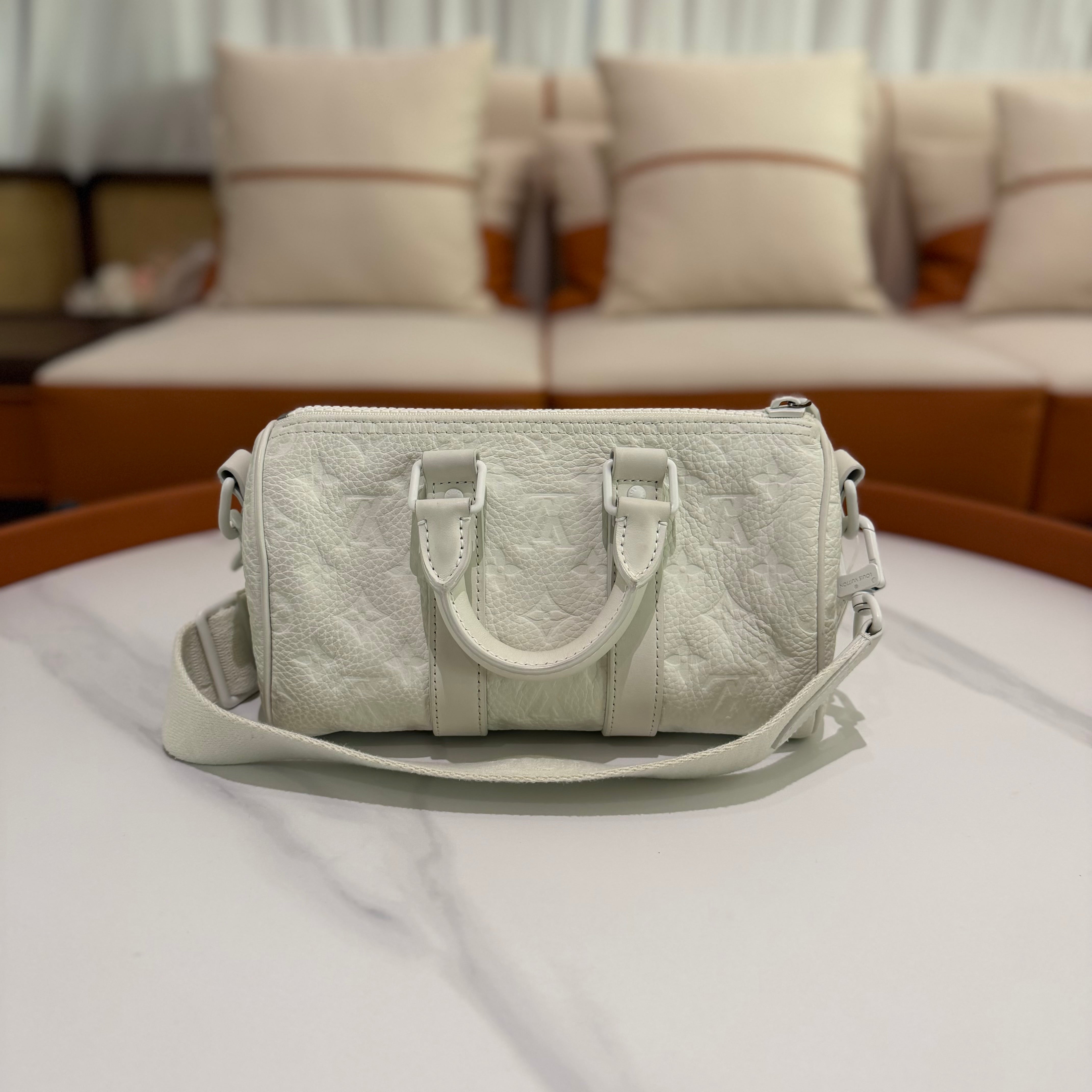 Louis Vuitton Keepall 25 White Embossed Monogram Top Handle Shoulder Bag
