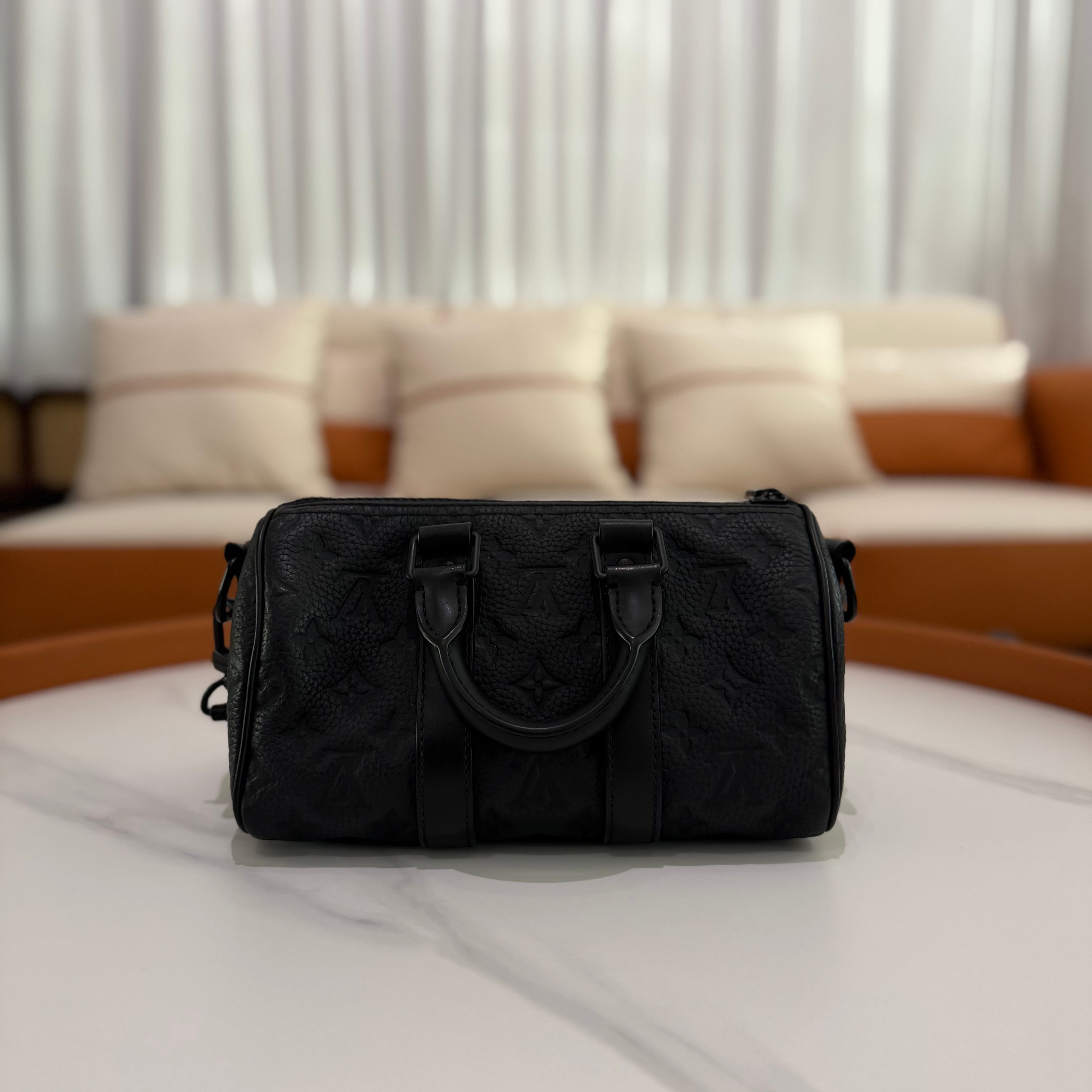 Louis Vuitton Keepall 25 Black Monogram Embossed Leather