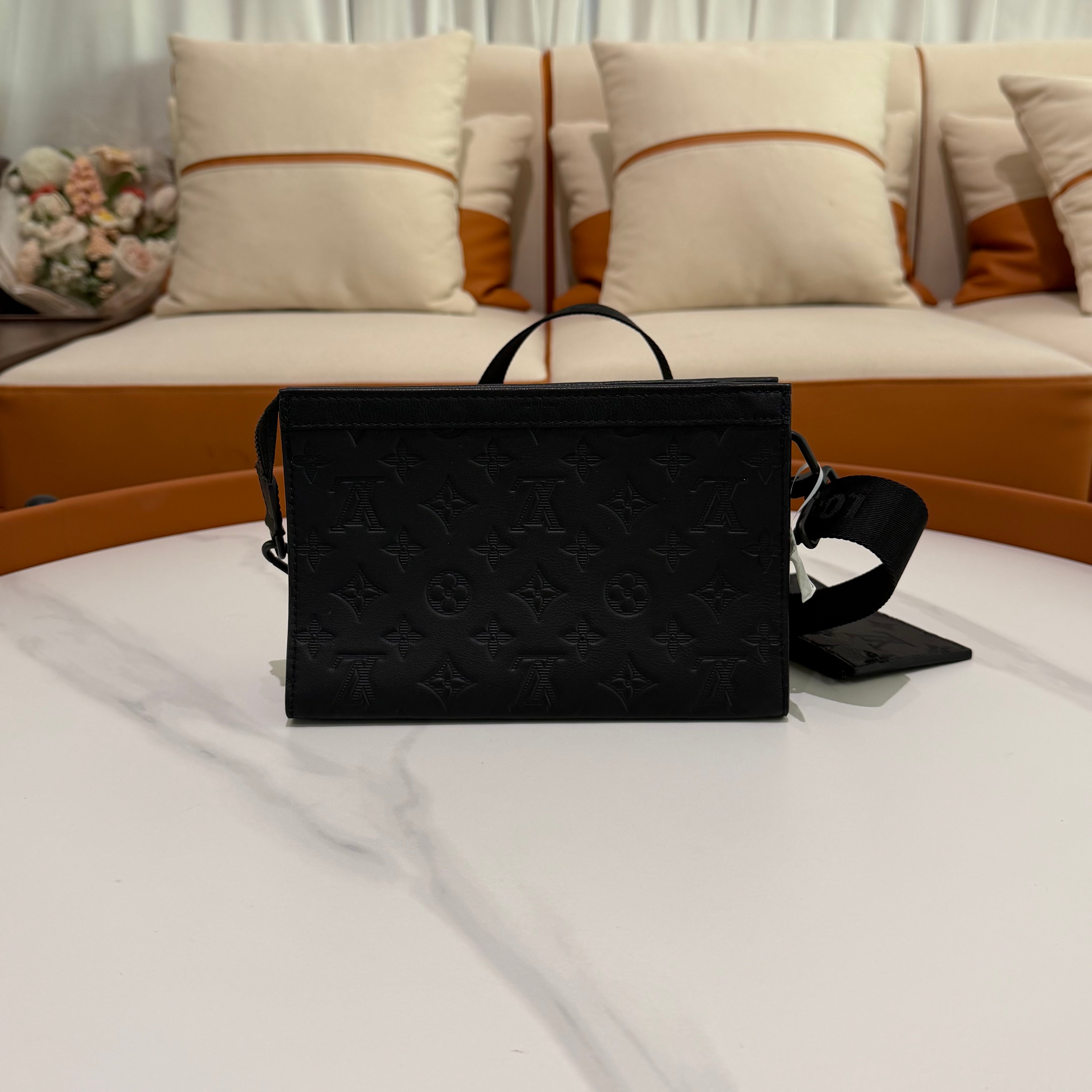 Louis Vuitton Gaston Wearable Wallet Embossed Leather Crossbody Bag