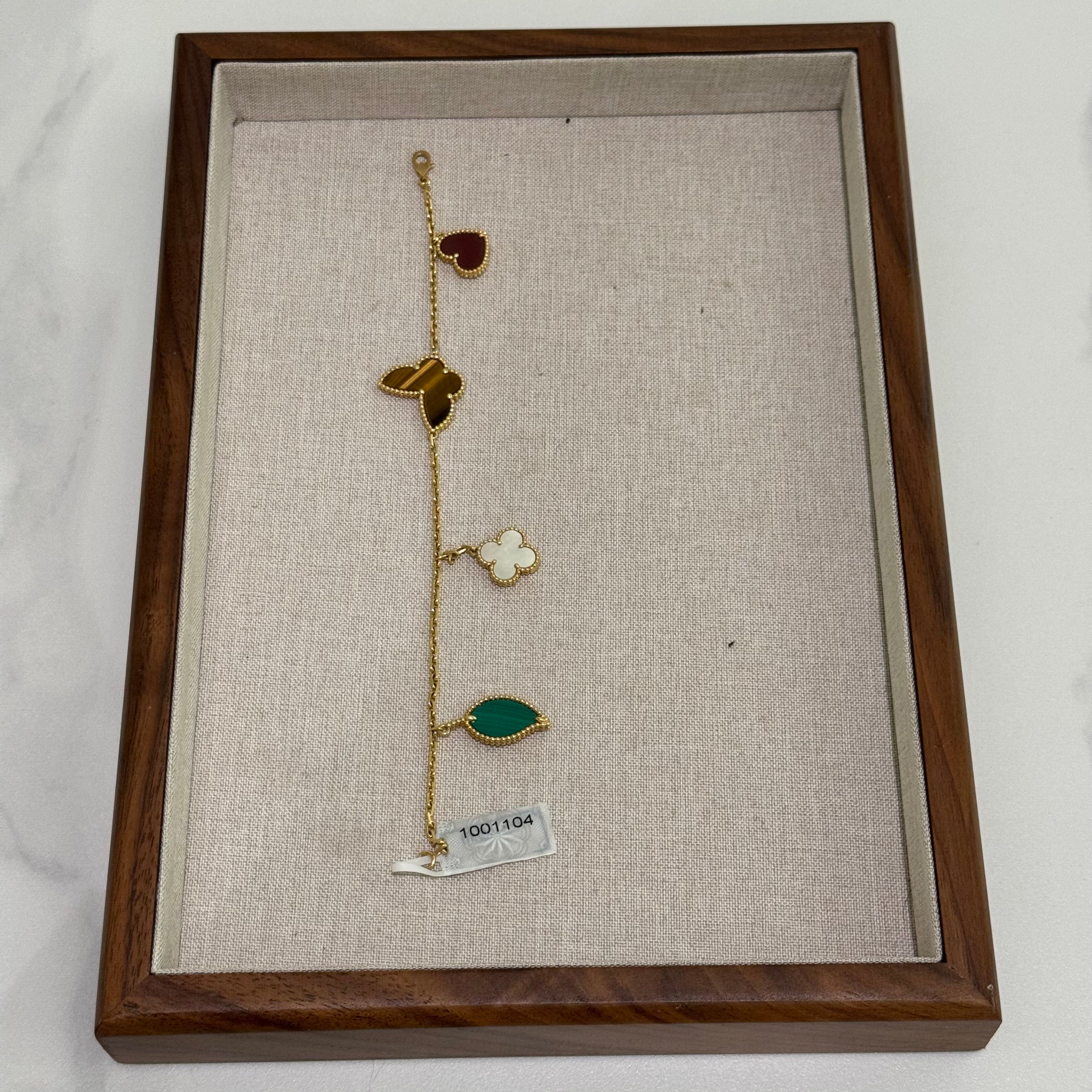 VAN CLEEF & ARPELS LUCKY ALHAMBRA BRACELET 18K YELLOW GOLD WITH MOTHER-OF-PEARL, MALACHITE, CARNELIAN & TIGER’S EYE