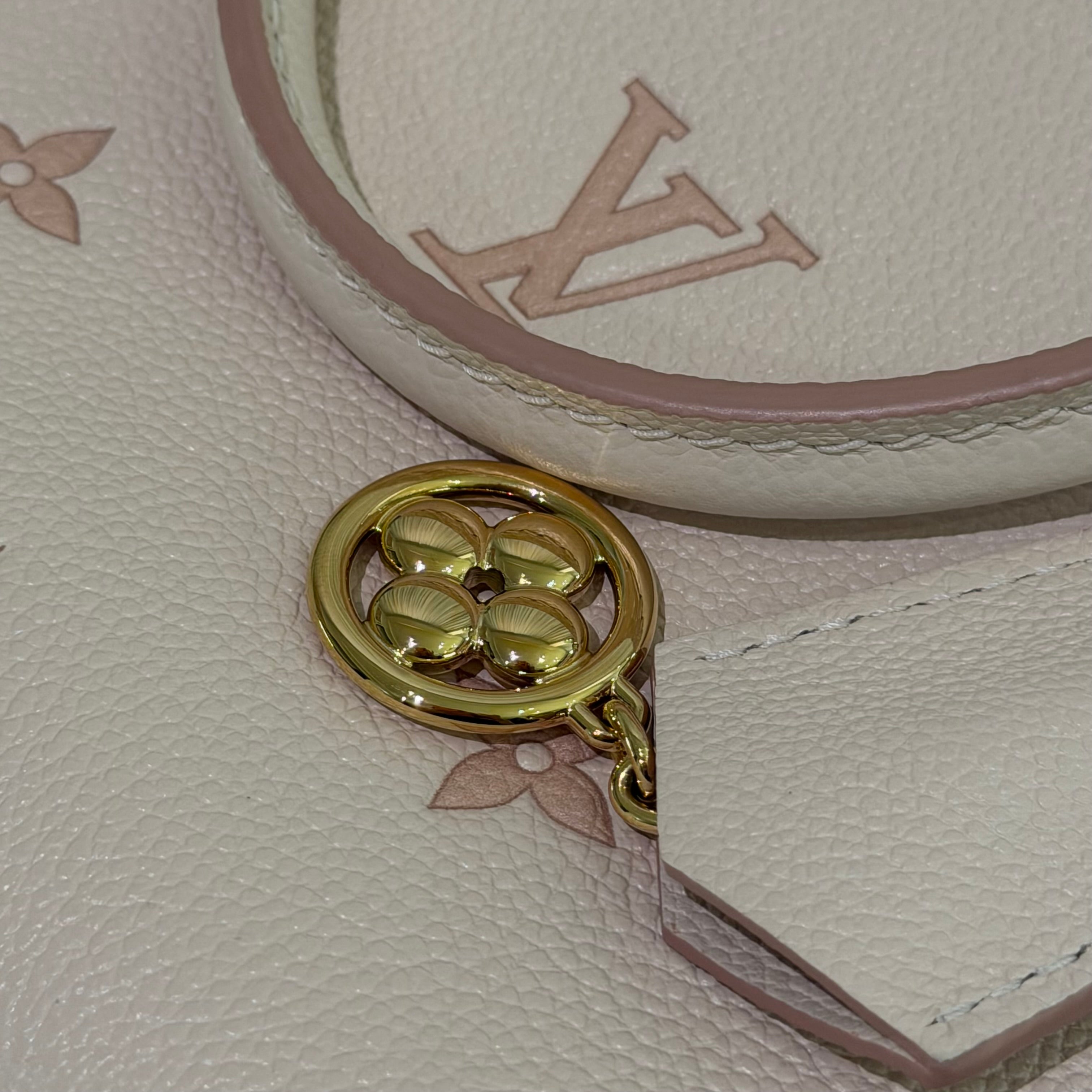 Louis Vuitton Onthego PM Almond Pink Monogram Empreinte Leather (Chip Model)