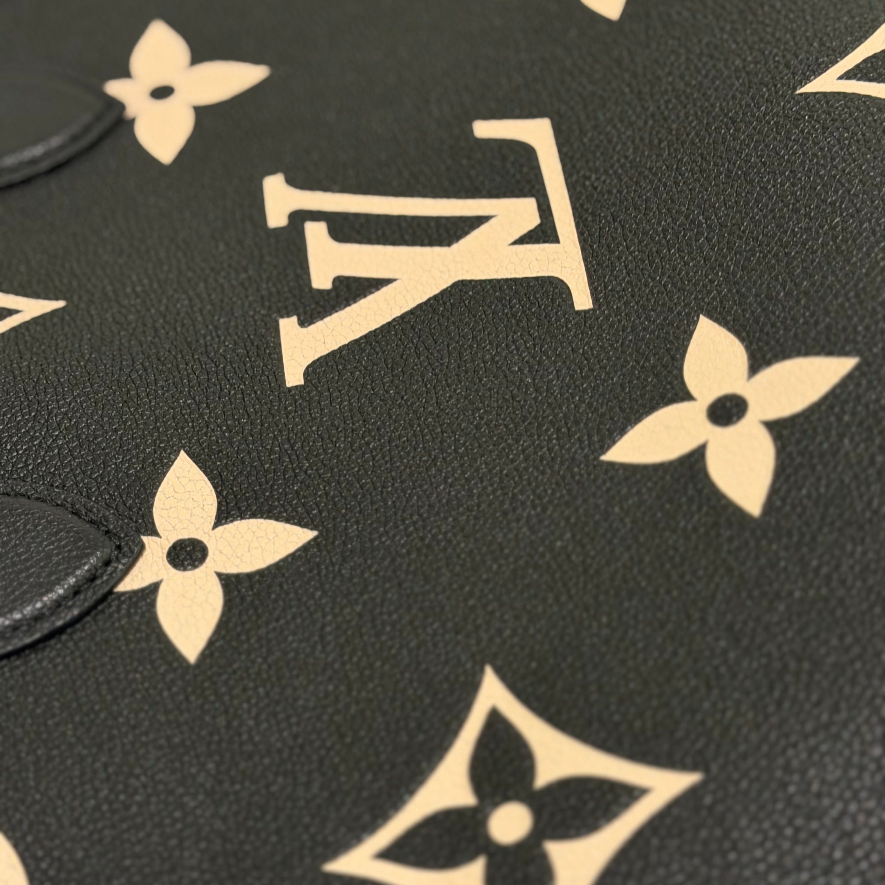 LOUIS VUITTON ON THE GO TOTE MEDIUM BLACK AND WHITE EMBOSSED LEATHER BAG