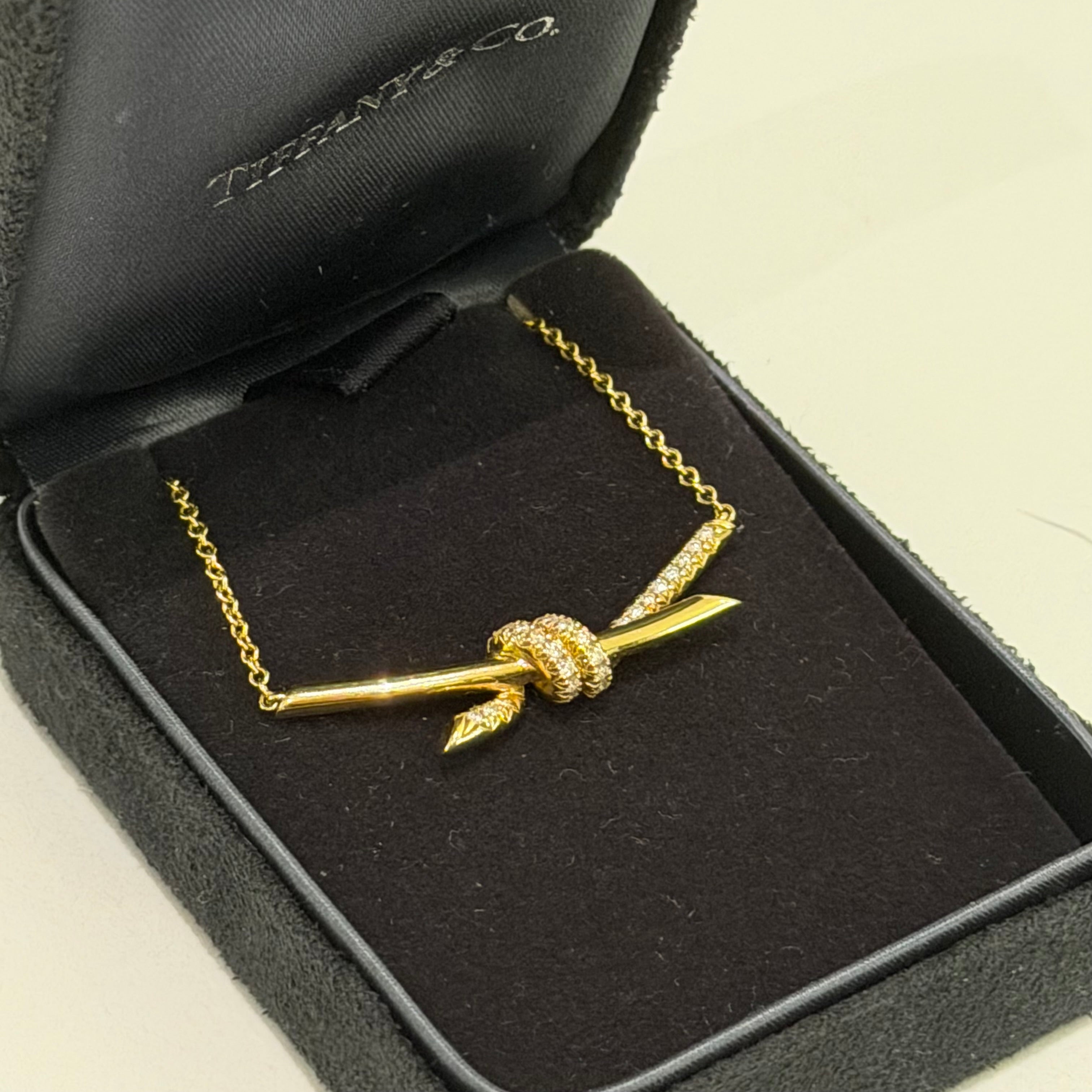 Tiffany & Co. Knot 18K Gold Single-Row Diamond Double-Ring Pendant Necklace