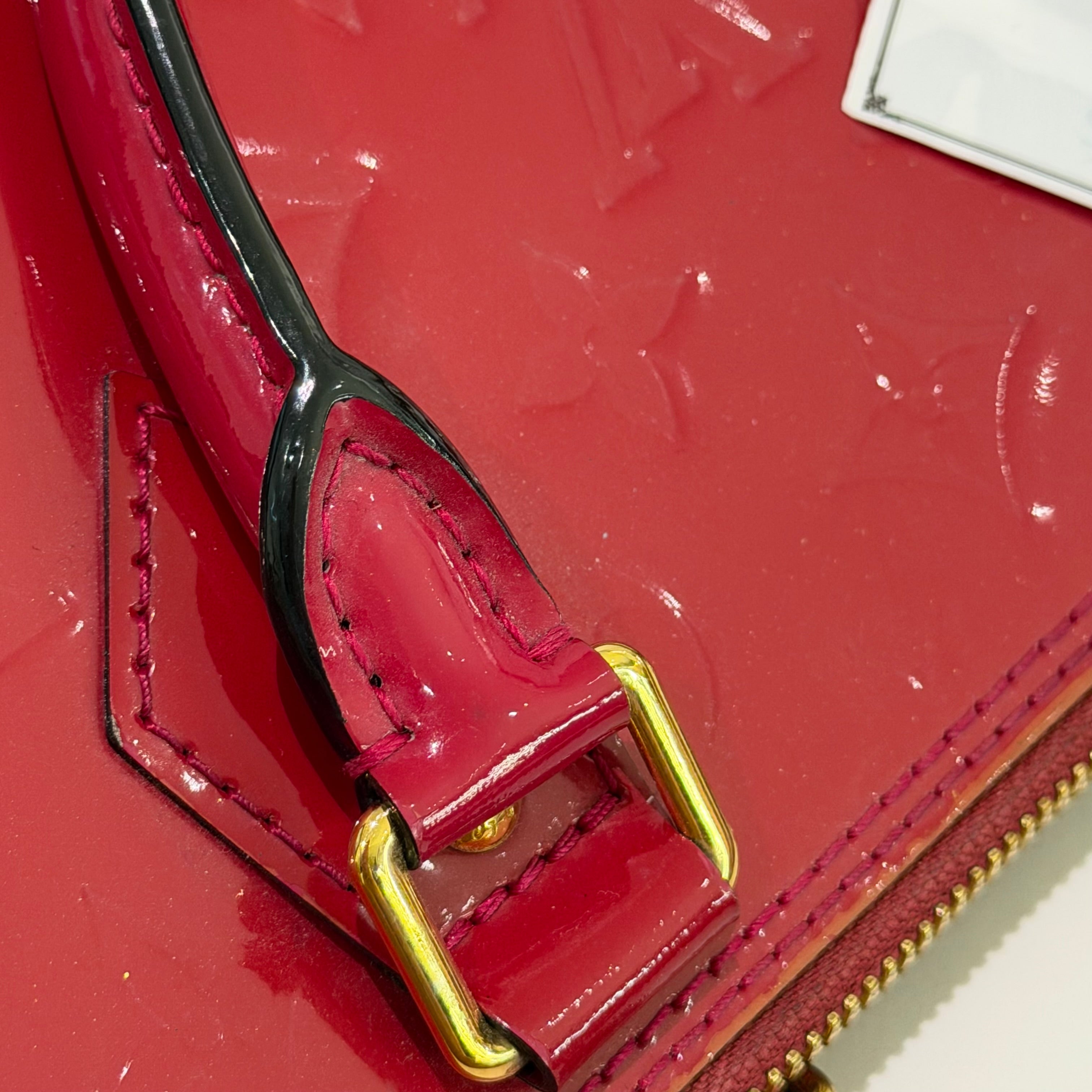 LOUIS VUITTON ALMA MEDIUM RED VERNIS LEATHER HANDBAG