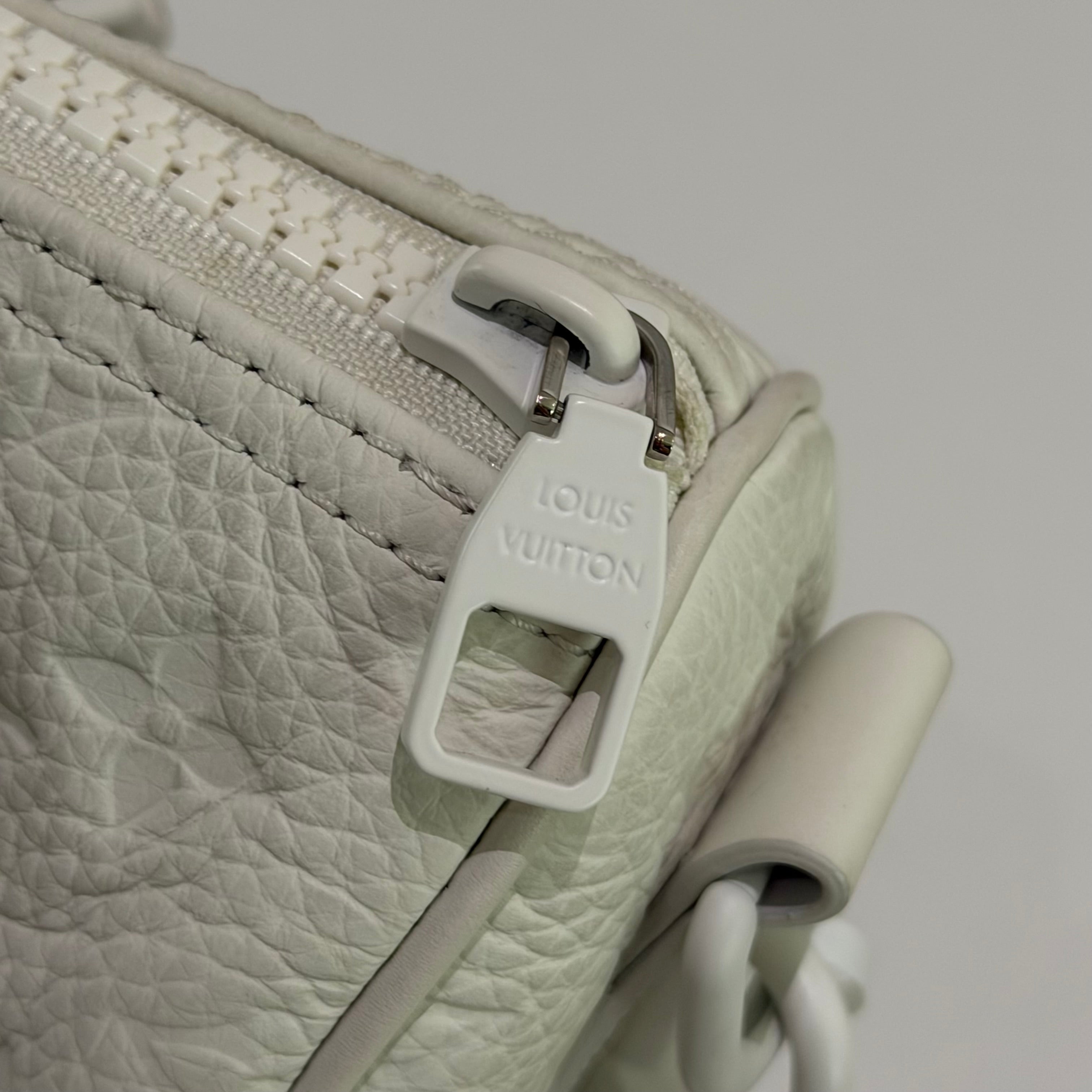 Louis Vuitton Keepall 25 White Embossed Monogram Top Handle Shoulder Bag | LOUIS VUITTON