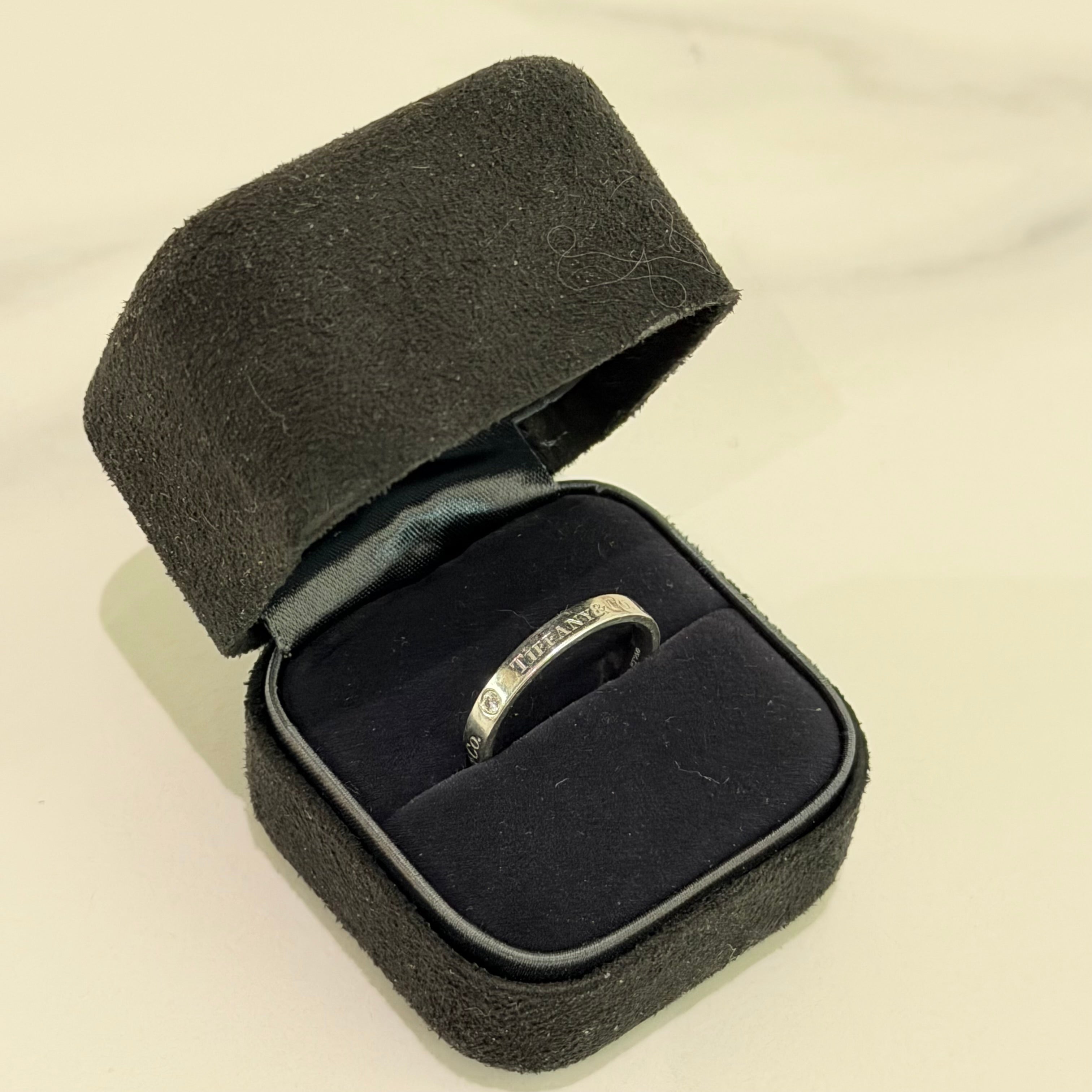 Tiffany PT950 Platinum Three-Diamond Ring (Narrow Band)