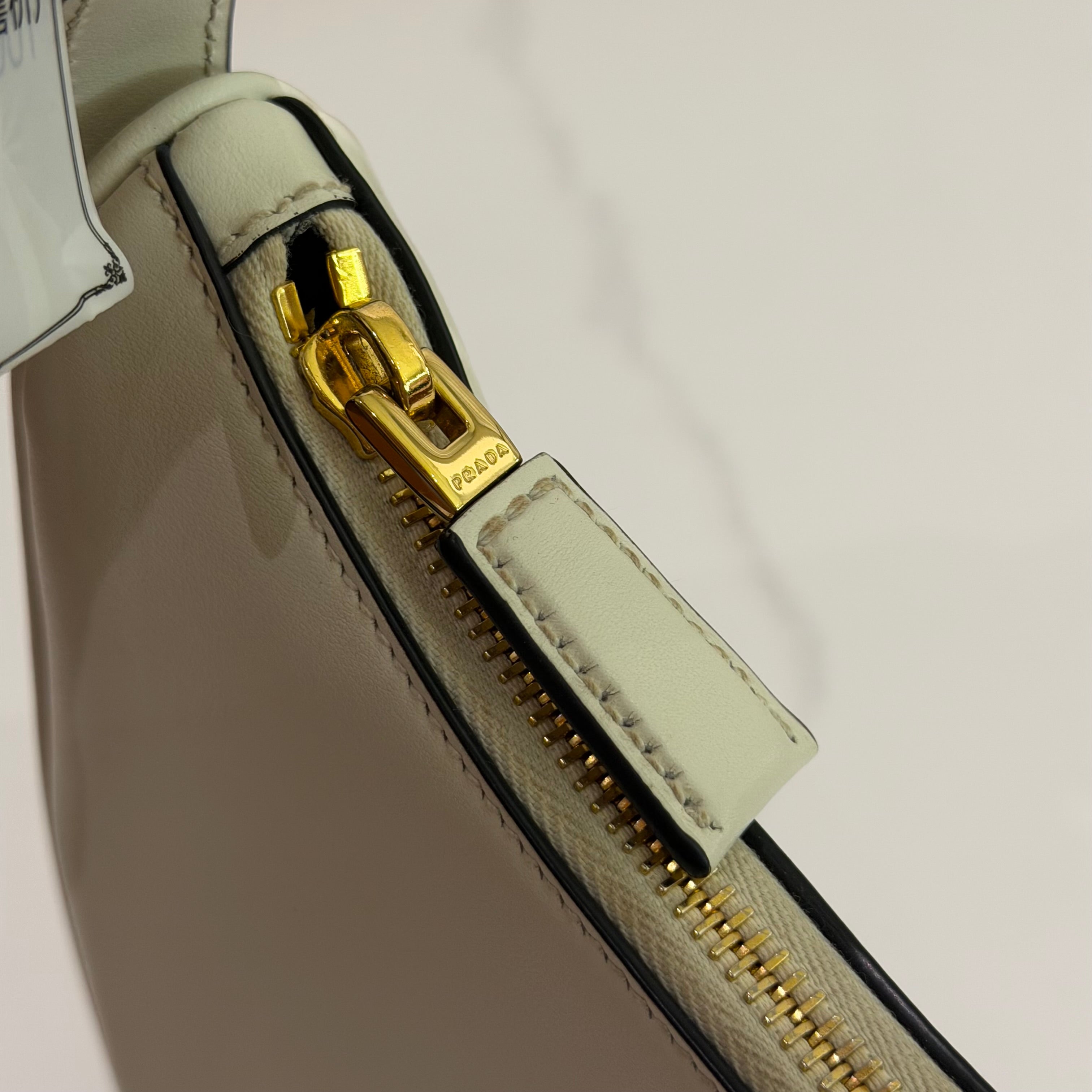 Prada Arqué White Crescent Shoulder Bag