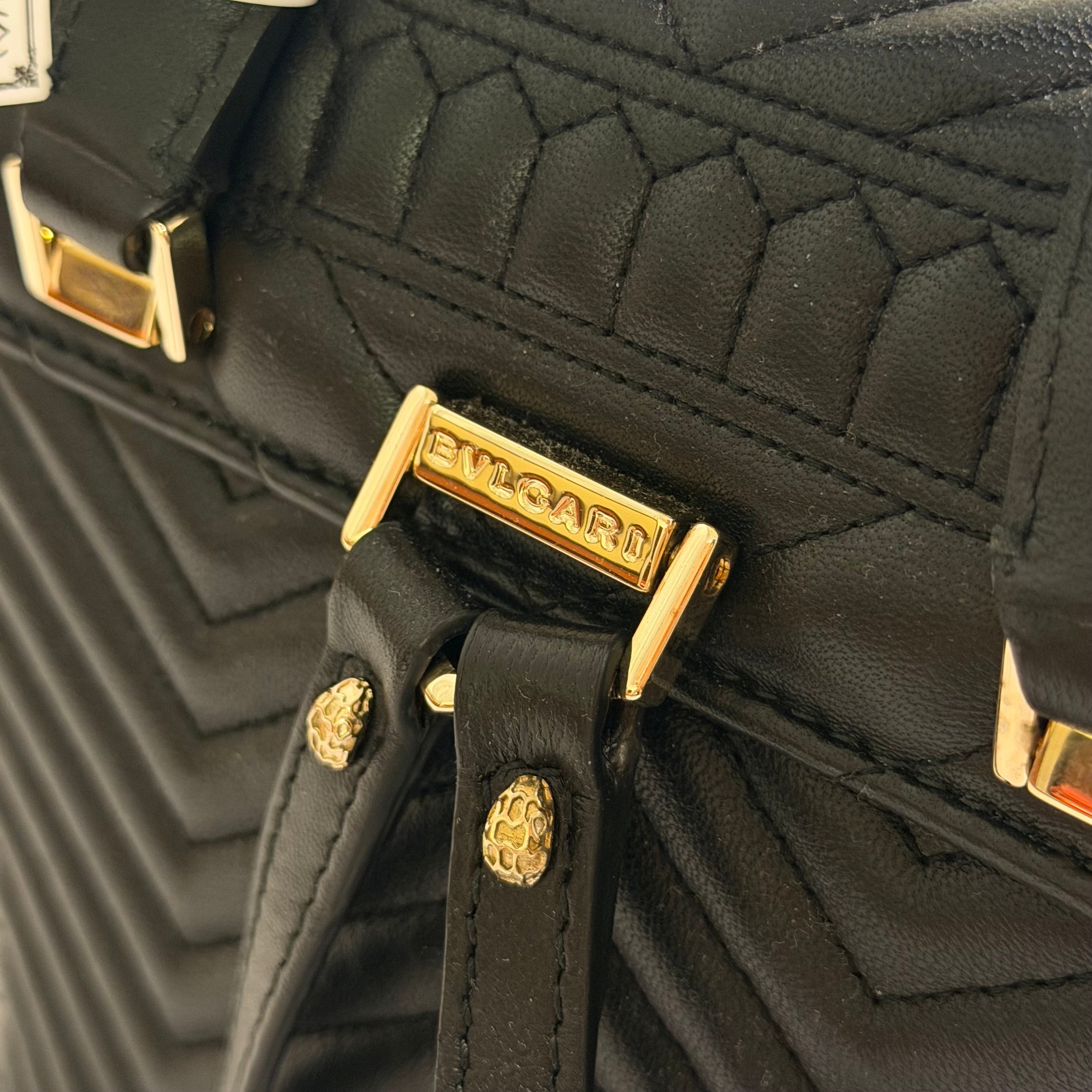Bvlgari Serpenti Forever Black V-Quilted Enamel Snakehead Backpack | BVLGARI