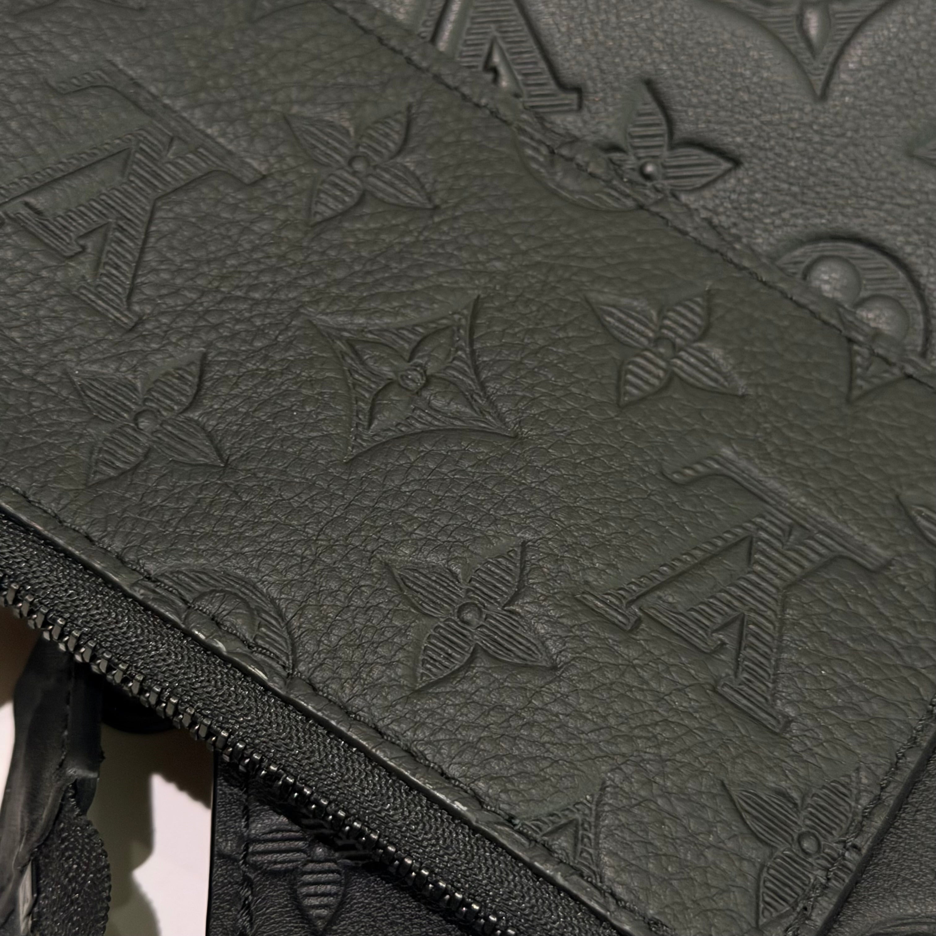Louis Vuitton Gaston Wearable Wallet Embossed Leather Crossbody Bag