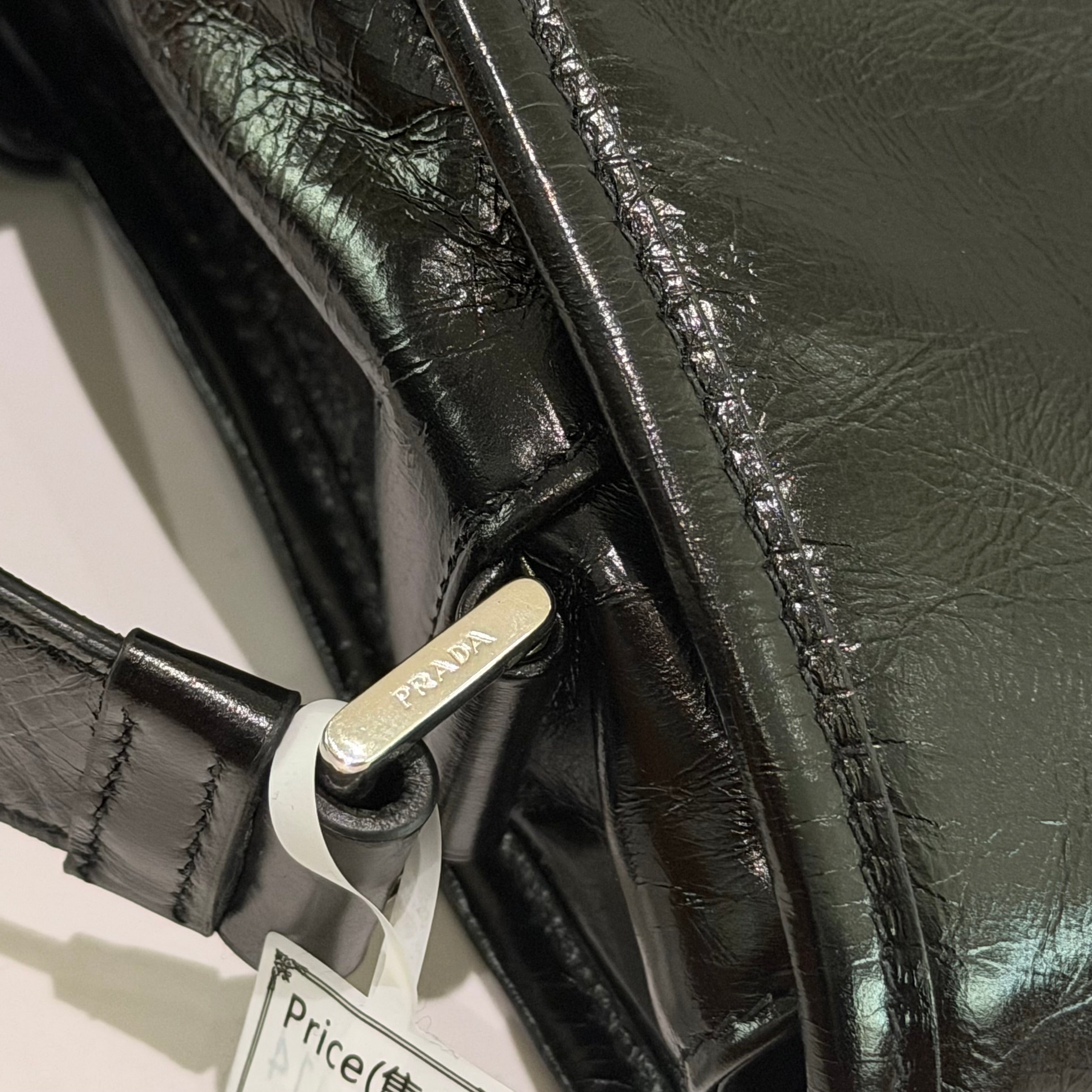 Prada Oiled Leather Messenger Bag