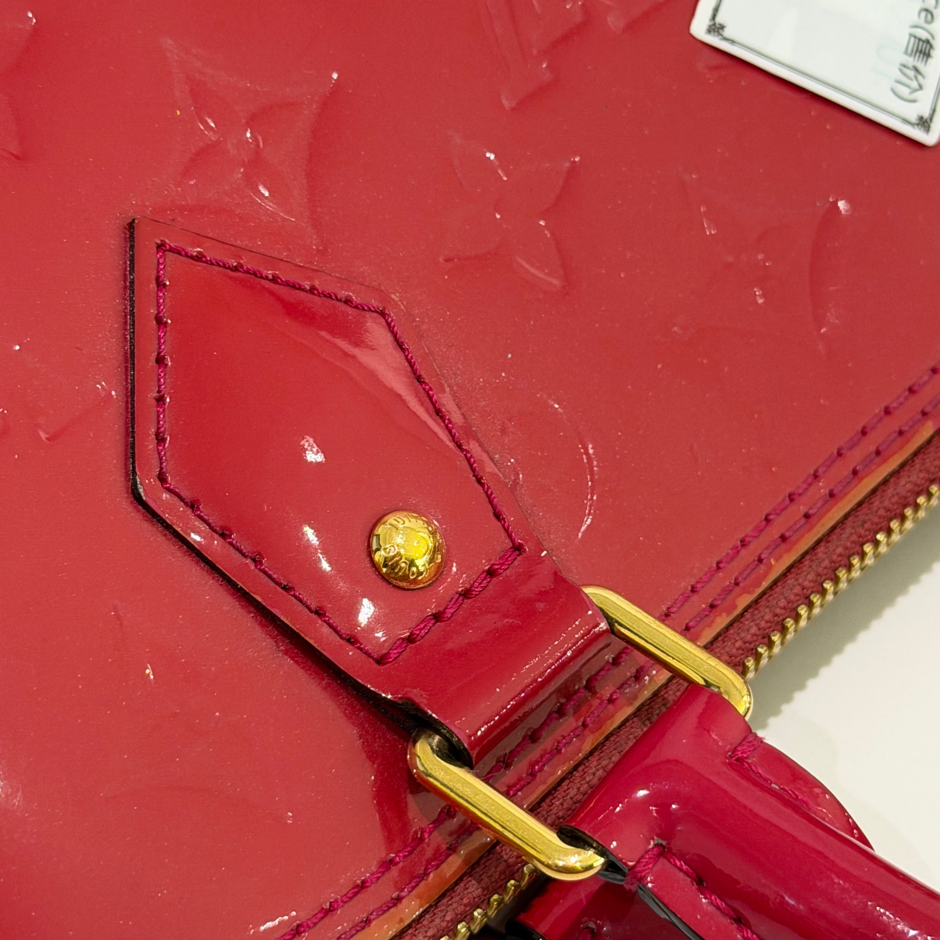 LOUIS VUITTON ALMA MEDIUM RED VERNIS LEATHER HANDBAG